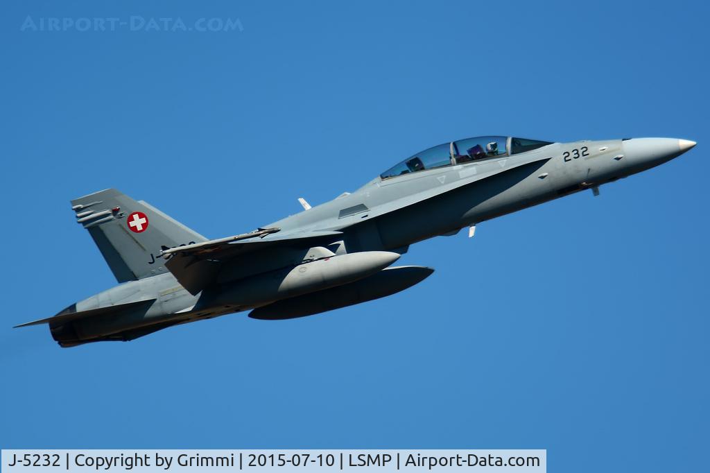 J-5232, 1996 McDonnell Douglas F/A-18D Hornet C/N 1308, Heavy equipped Hornet takes off for another mission
