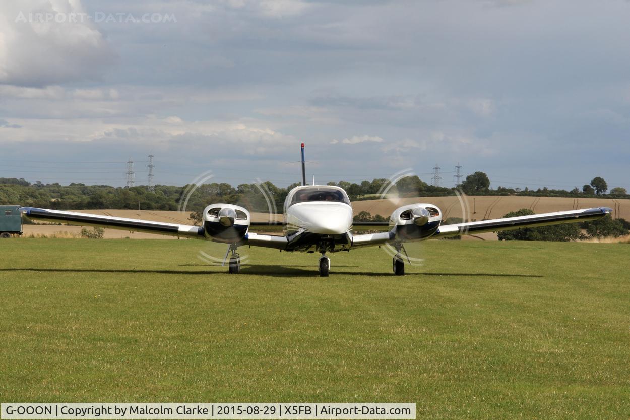 G-OOON, 1982 Piper PA-34-220T Seneca III C/N 34-8533024, Piper PA-34-220T Seneca III taxis in bringing the pilot of T6 G-BJST for the return to Duxford. Fishburn Airfield, August 29th 2015.