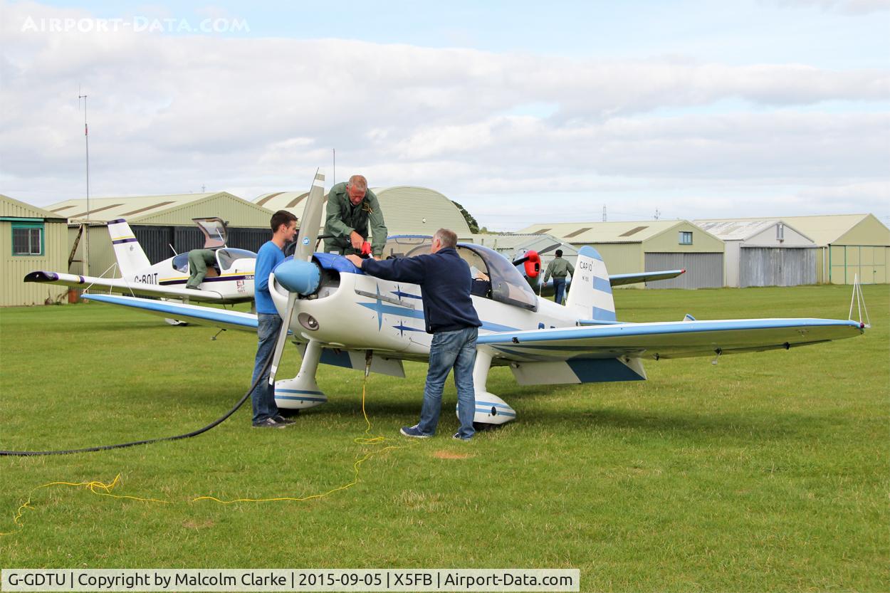 G-GDTU, 1983 Mudry CAP-10B C/N 193, All hands to the pumps for this Mudry CAP-10B, Fishburn Airfield, September 5th 2015.
