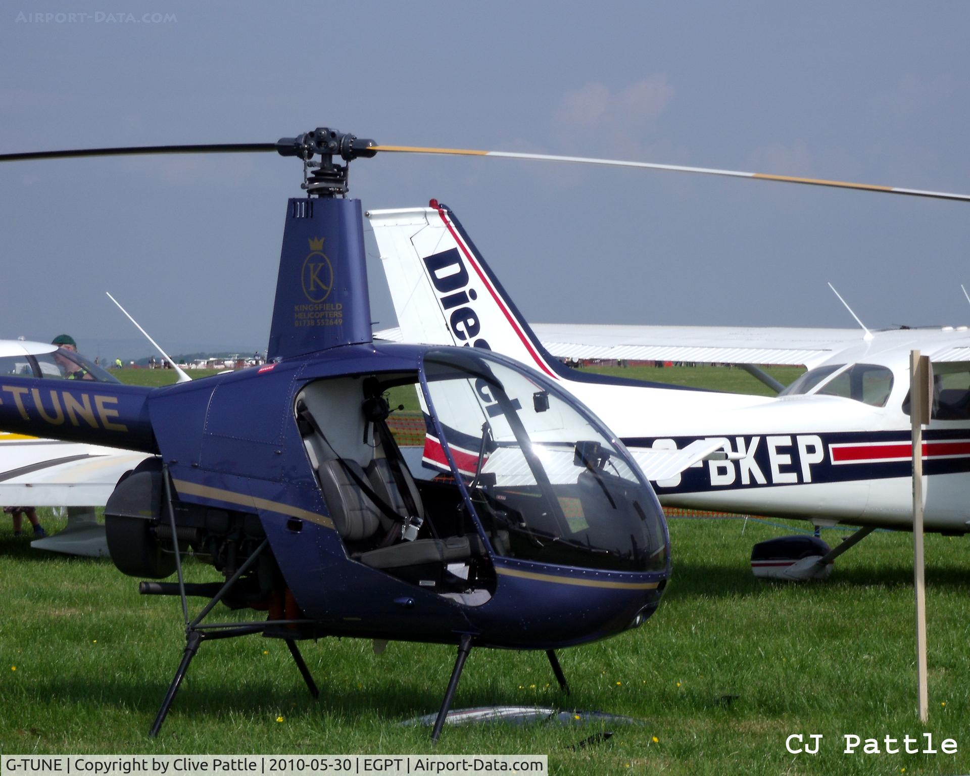 G-TUNE, 1988 Robinson R22 Beta C/N 0818, On display in the static park during the Heart of Scotland Airshow held at Perth (Scone) airfield EGPT