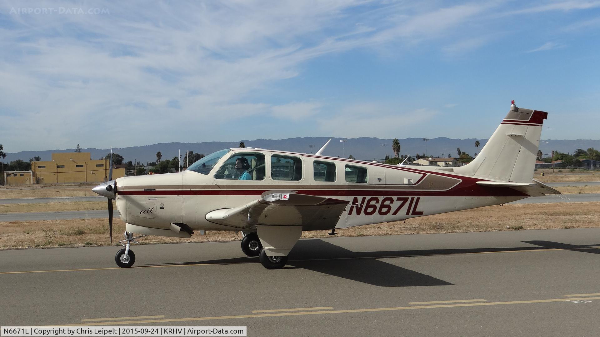 N6671L, 1983 Beech A36 Bonanza 36 C/N E-2079, Locally-based 1983 Beechcraft A36 Bonanza taxing out for departure after getting new avionics at Reid Hillview Airport, San Jose, CA.