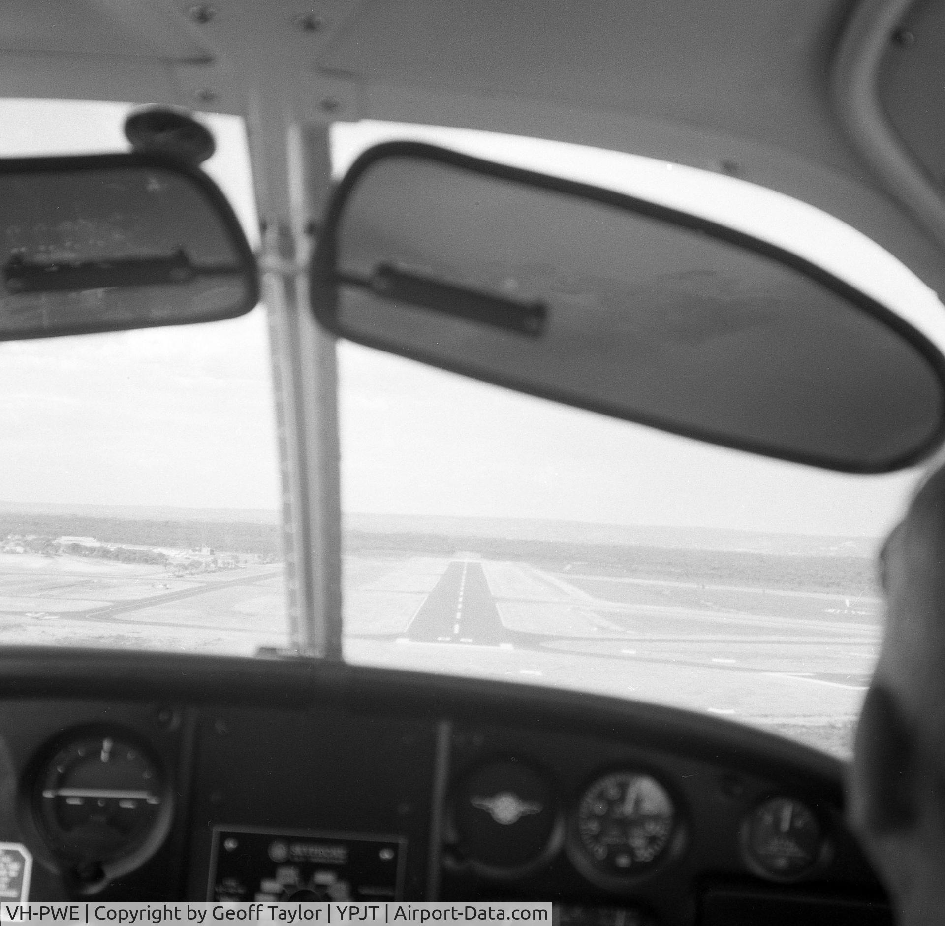 VH-PWE, 1967 Piper PA-28-140 Cherokee C/N 28-23078, On final runway 06 at Jandokot (Notice no runway 06R in those days).
Pilot Graham Taylor.