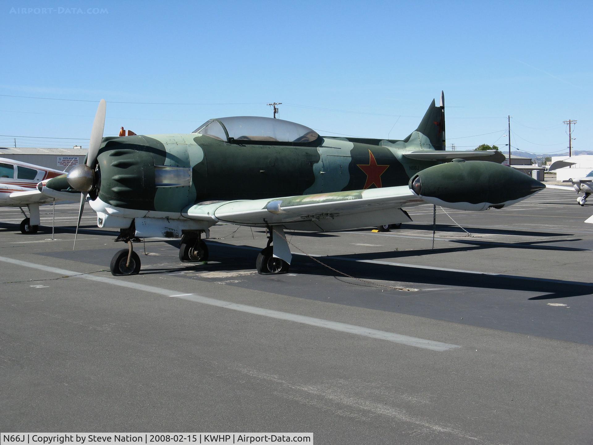 N66J, 1945 North American AT-6F C/N 44-82028, Bacon Aircraft modification of AT-6F Texan in pseudo Soviet AF colors @ Whiteman Airport, Pacoima CA