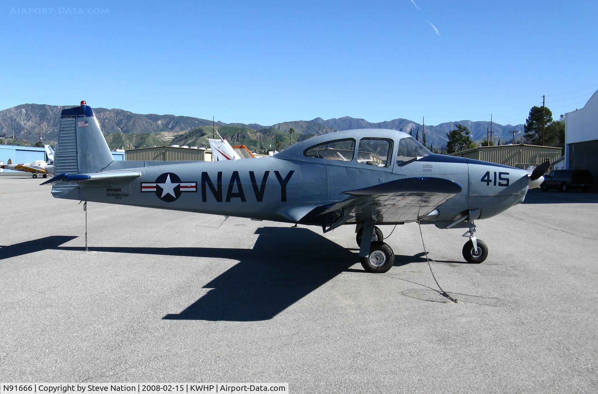 N91666, 1947 North American Navion (NA-145) C/N NAV-4-415, 1946 North American Navion painted as Navy 415 with USS Badeoing Strait (CVE-116) titles @ Whiteman Airport, Pacoima, CA. Wonder if owner served on this 