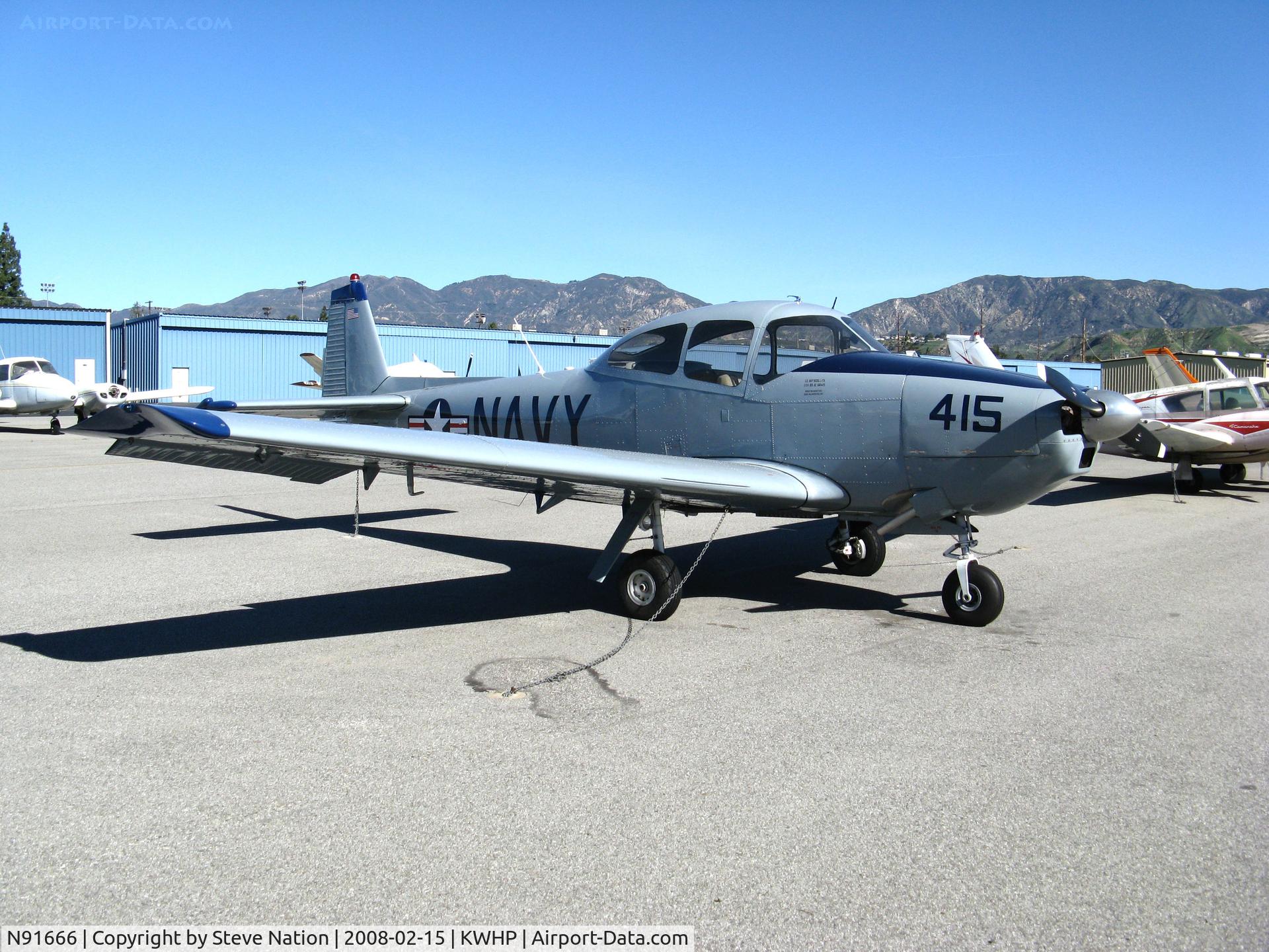 N91666, 1947 North American Navion (NA-145) C/N NAV-4-415, 1946 North American Navion painted as Navy 415 with USS Badeoing Strait (CVE-116) titles @ Whiteman Airport, Pacoima, CA. Wonder if owner served on this 