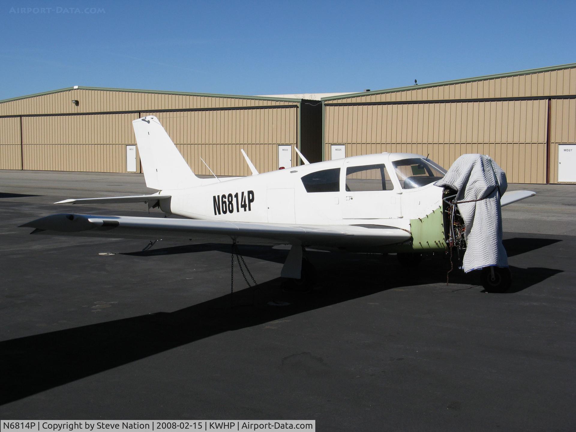 N6814P, 1960 Piper PA-24-250 Comanche C/N 24-1947, 1960 Piper Pa-24-250 Comanche minus engine with innovative cover @ Whiteman Airport, Pacoima, CA