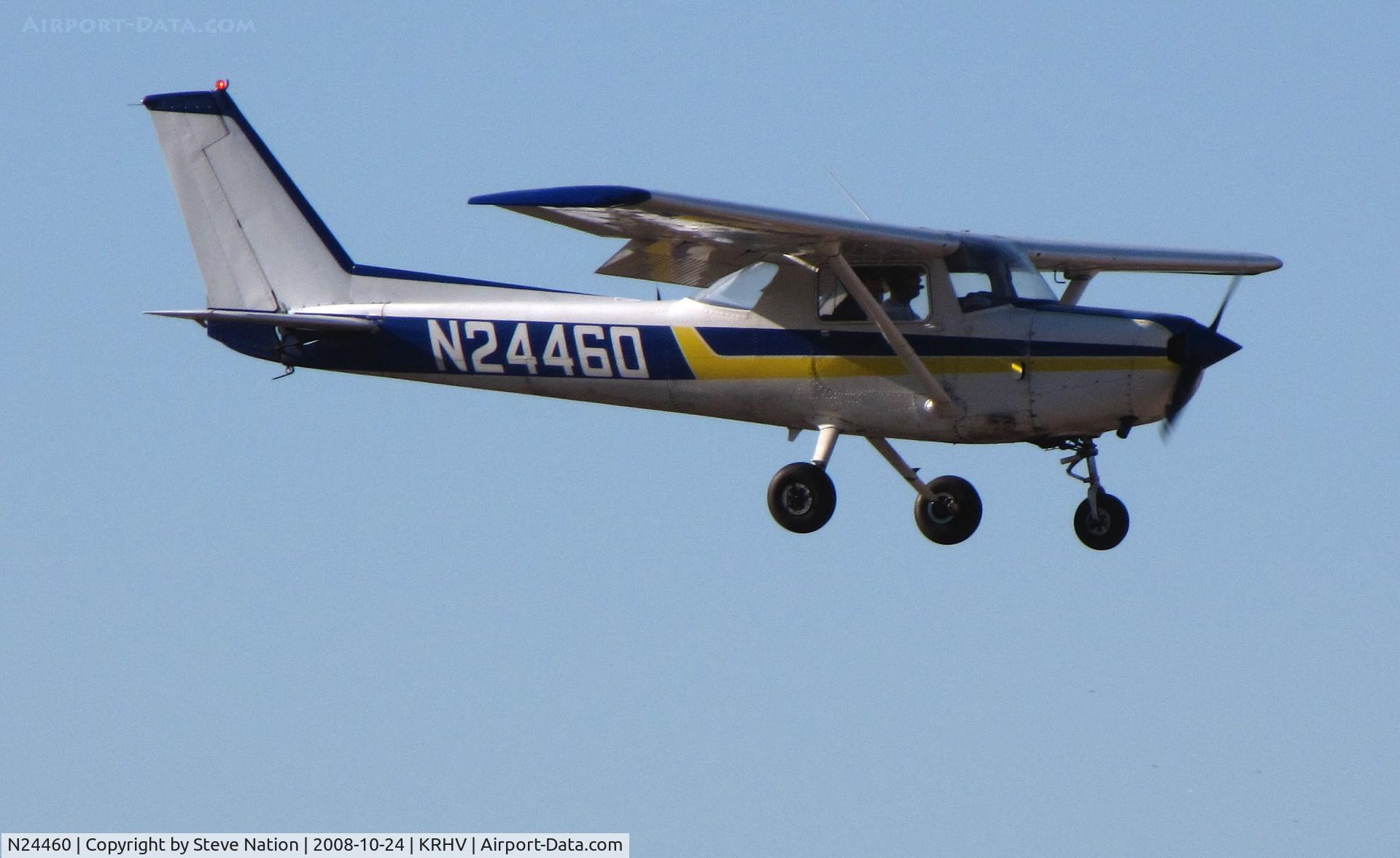 N24460, 1977 Cessna 152 C/N 15280267, Flying Twenty 1977 Cessna 152 over the threshold @ Reid-Hillview Airport, San Jose, CA (cancelled from U.S. Register March 10, 2011)