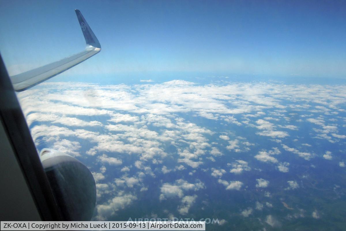 ZK-OXA, 2013 Airbus A320-232 C/N 5269, Snow-topped Mt Ruapheu is camouflaged in the clouds (AKL-WLG)