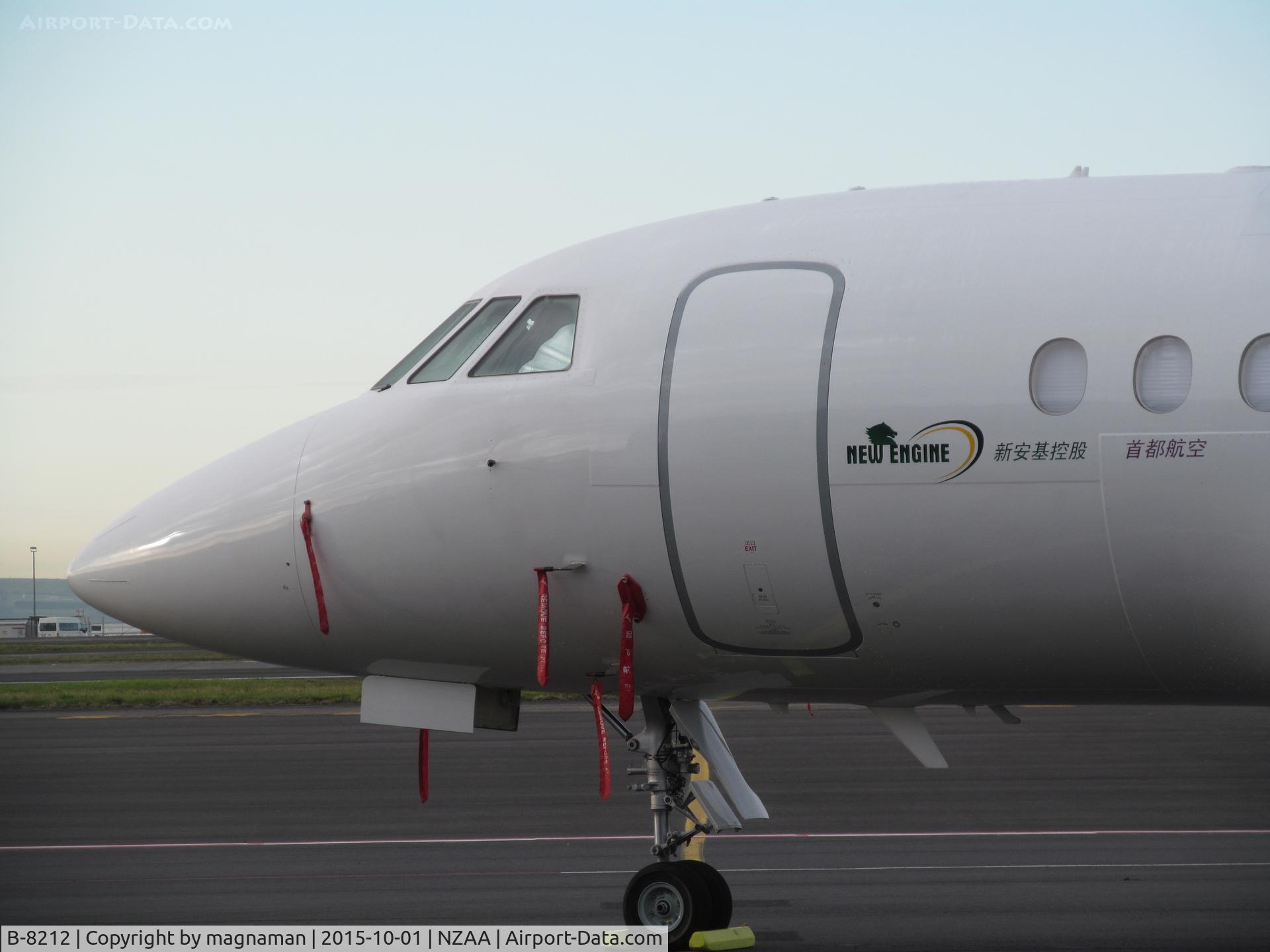 B-8212, 2013 Dassault Falcon 900EX C/N 276, Logo by cockpit door