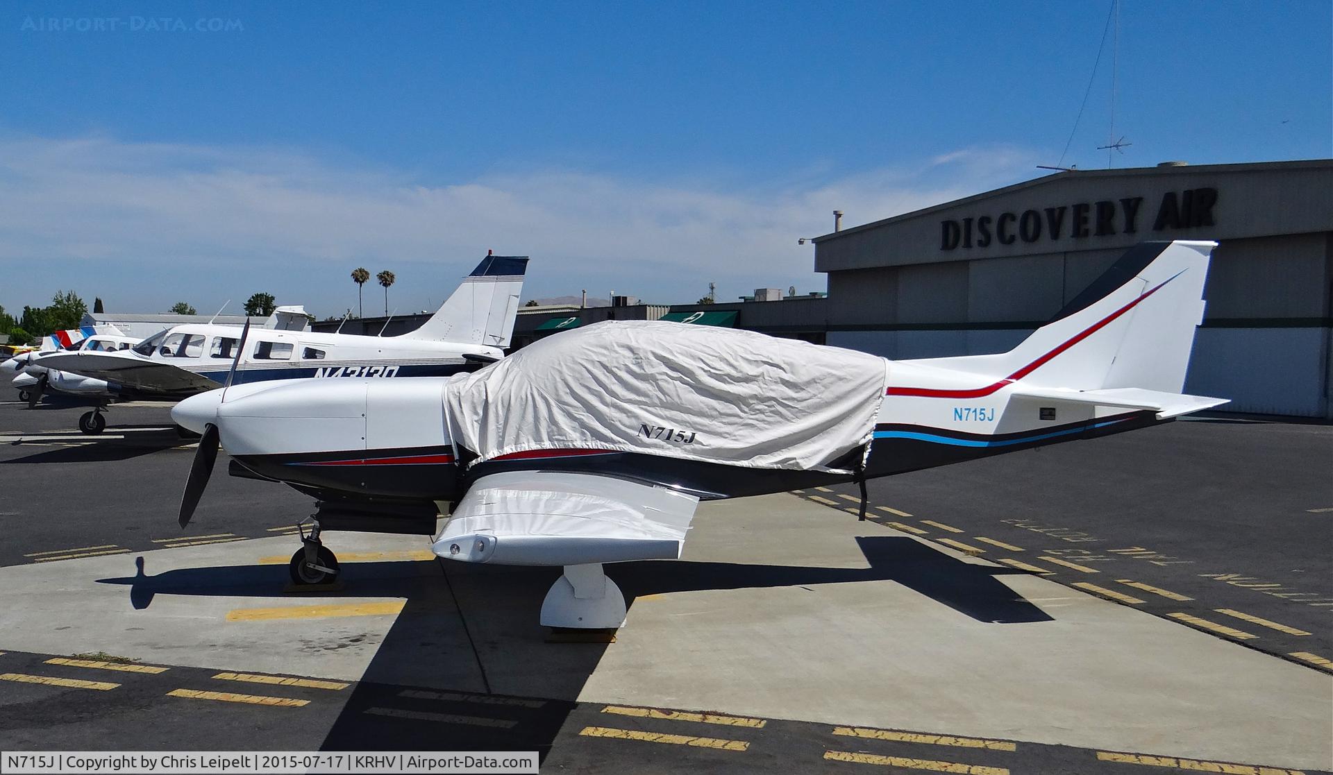 N715J, Stoddard-Hamilton Glasair SH2R C/N 2394, Nevada-based Glasair (with cover) sitting on the Nice Air helipads at Reid Hillview Airport, San Jose, CA.