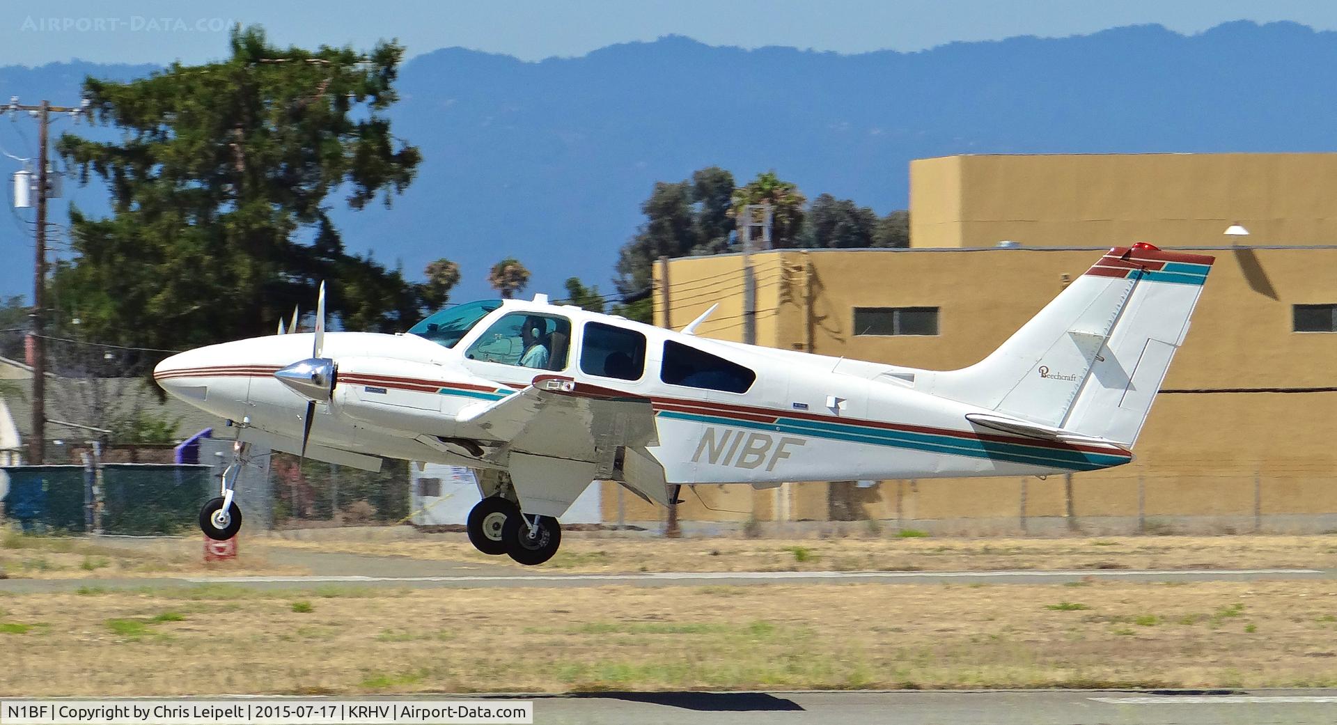 N1BF, 1973 Beech E-55 Baron C/N TE-961, Locally-based 1973 Beechcraft 55 landing runway 13R after coming in IFR from John Wayne at Reid Hillview Airport, San Jose, CA.