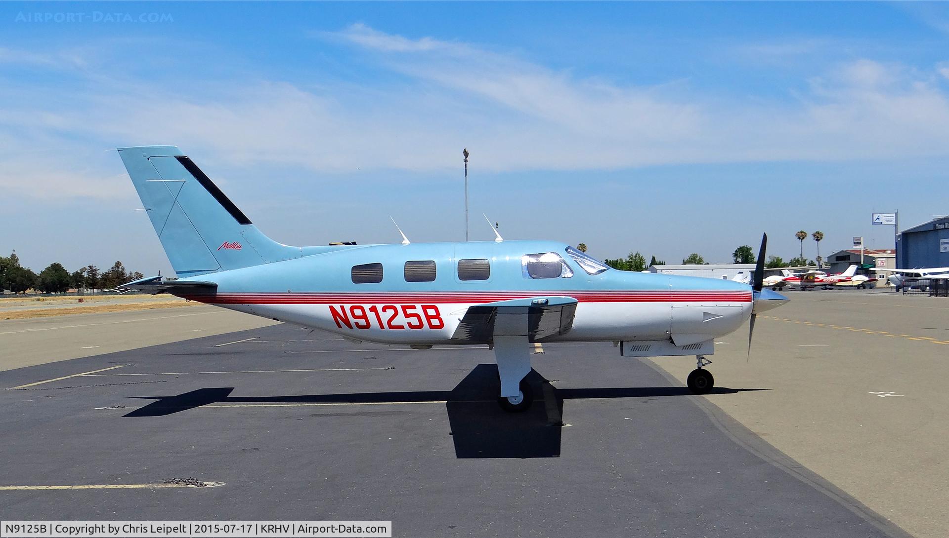 N9125B, 1987 Piper PA-46-310P Malibu C/N 4608068, Stockton Aviation Group LLC (Stockton, CA) colorful 1987 Piper Malibu parked on the transient ramp at Reid Hillview Airport, San Jose, CA.
