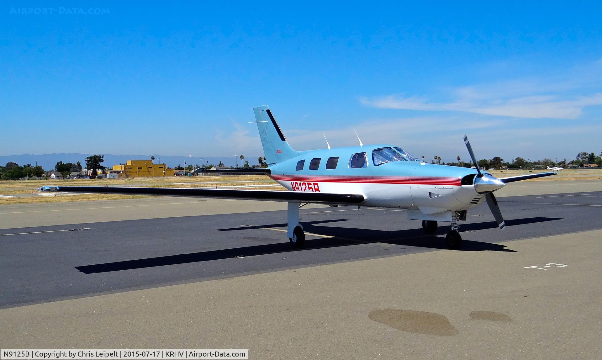 N9125B, 1987 Piper PA-46-310P Malibu C/N 4608068, Stockton Aviation Group LLC (Stockton, CA) colorful 1987 Piper Malibu parked on the transient ramp at Reid Hillview Airport, San Jose, CA.