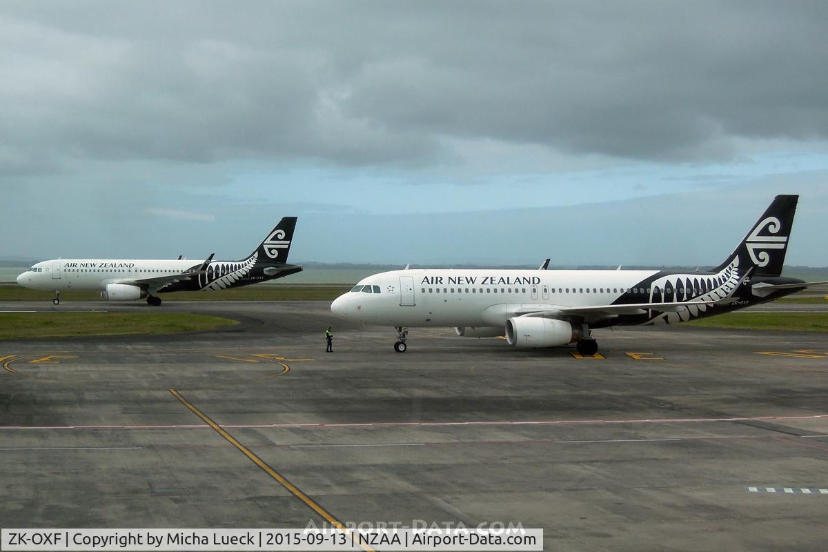 ZK-OXF, 2014 Airbus A320-232 C/N 6182, ZK-OXF just pushed back, while ZK-OXA just landed and taxies to the gate