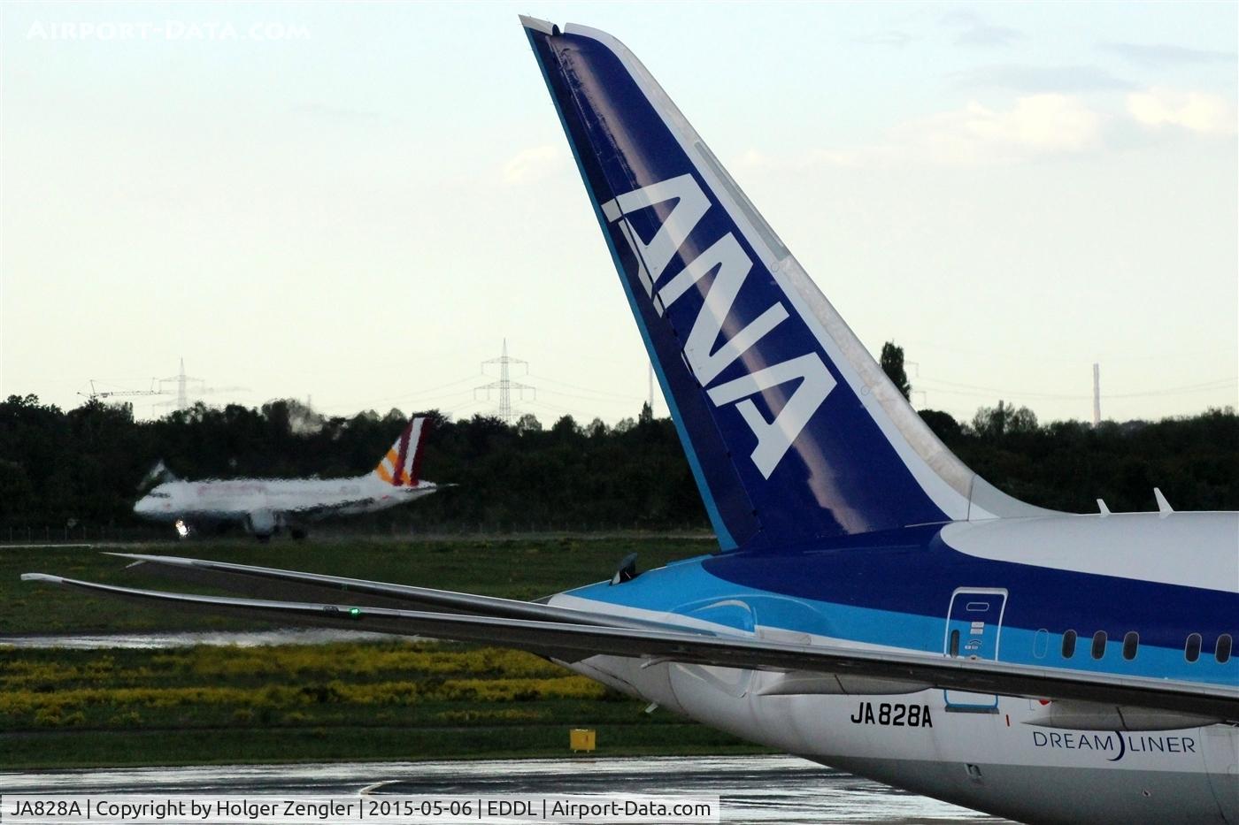JA828A, 2014 Boeing 787-8 Dreamliner Dreamliner C/N 42248, Tail unit with hot air on an aircraft.....