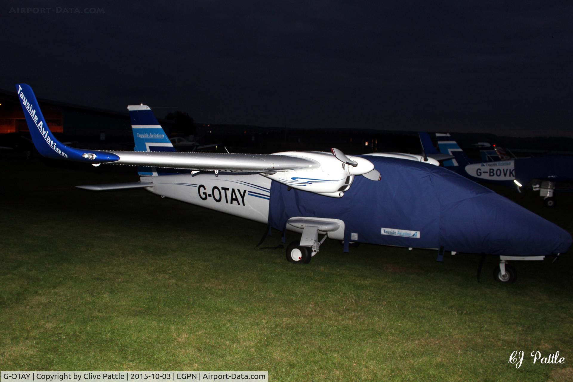 G-OTAY, 2010 Tecnam P-2006T C/N 049, Out to grass - a night shot at Dundee Riverside EGPN