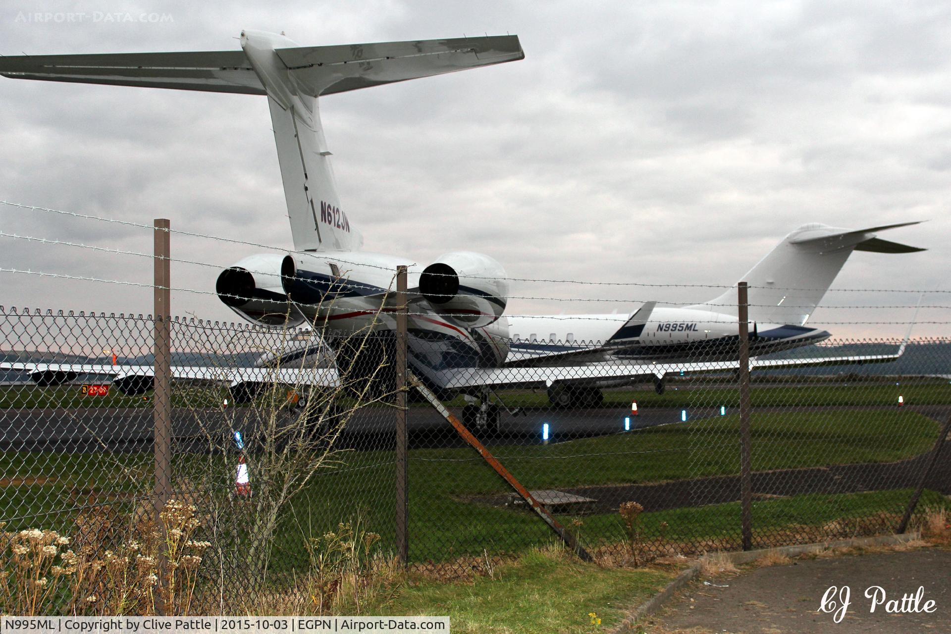 N995ML, 2008 Bombardier BD-700-1A10 Global Express C/N 9322, Parked up trying to hide from view at Dundee Riverside Airport EGPN during the Dunhill Golf Champiuonships at nearby St Andrews