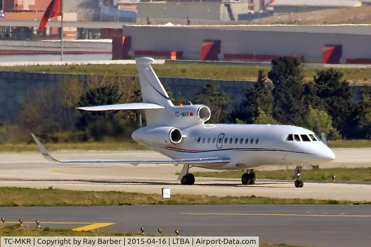 TC-MKR, 2011 Dassault Falcon 900LX C/N 257, Dassault Falcon 900LX [257] Istanbul-Ataturk~TC 16/04/2015. Taken through the glass of the hotel room.