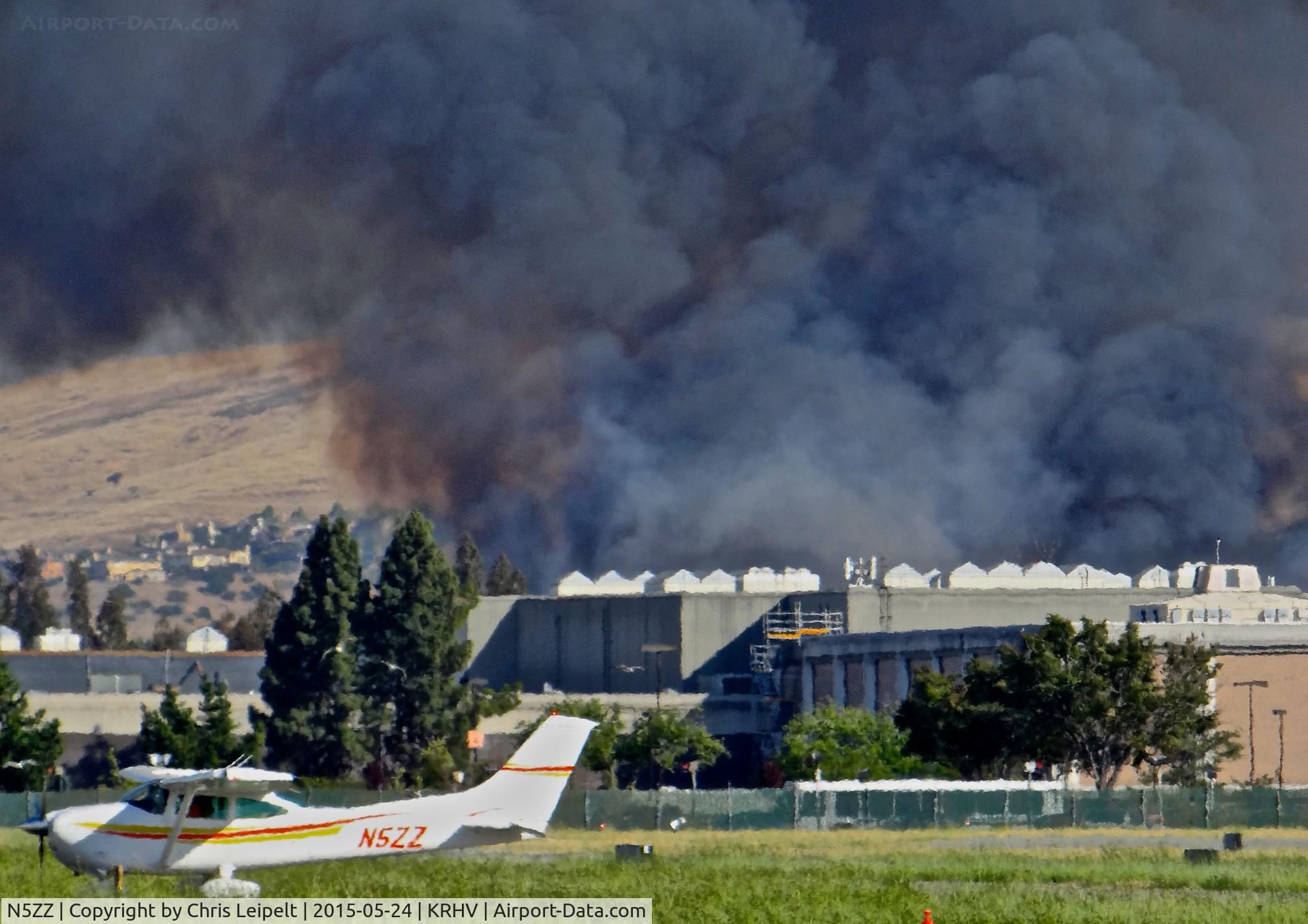 N5ZZ, 1977 Cessna 182Q Skylane C/N 18265840, Locally-based 1977 Cessna 182Q clear of runway 31R (note the huge fire just south of the Eastridge Mall) at Reid Hillview Airport, San Jose, CA.