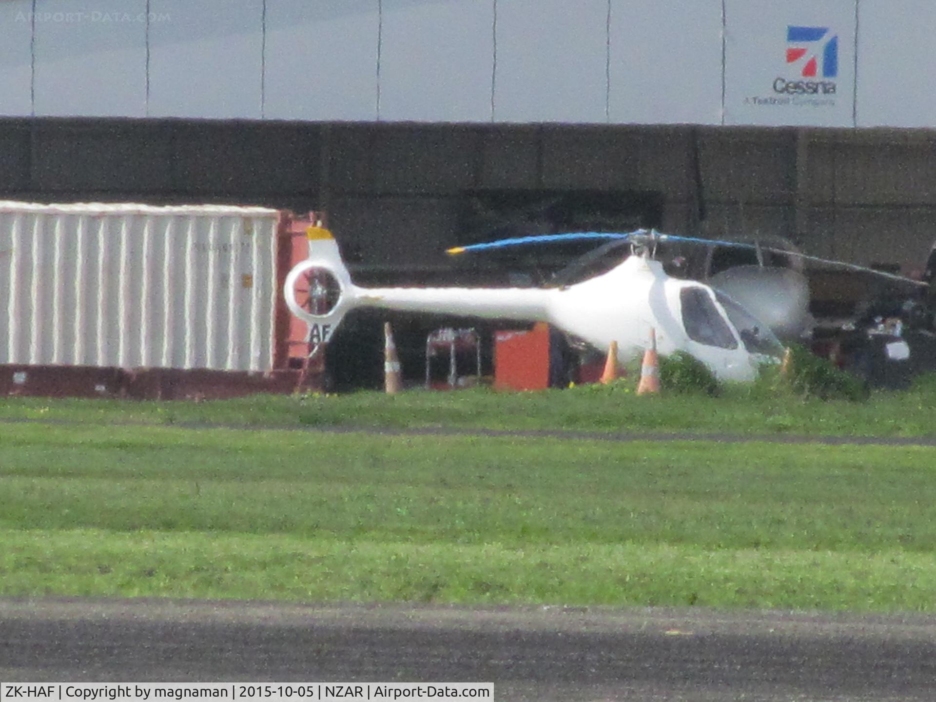 ZK-HAF, Guimbal Cabri G2 C/N 1084, A long range shot of HAF today at Ardmore - noted flying over CBD later in the day.