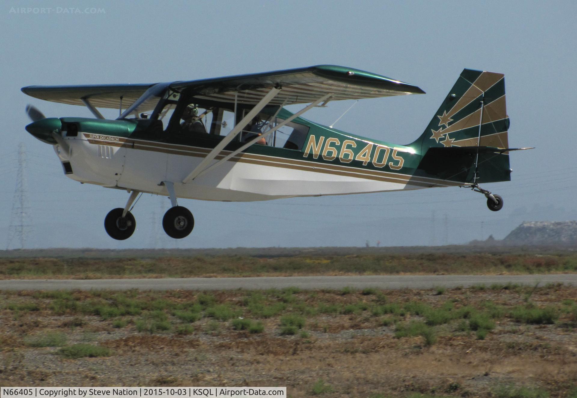 N66405, 1996 American Champion 8KCAB Decathlon C/N 783-96, San Carlos Flight Center 1996 Champ 8KCAB over the threshold @ San Carlos Airport, CA
