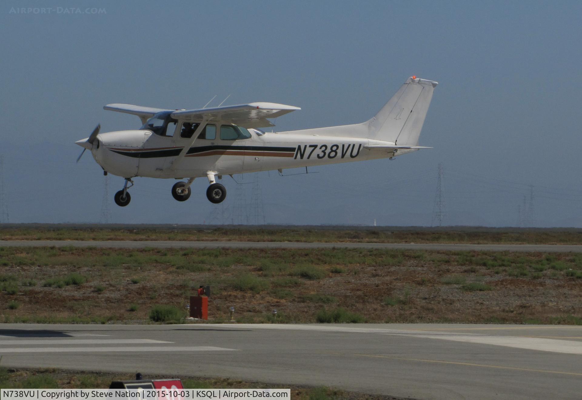 N738VU, 1978 Cessna 172N C/N 17270279, Five Rivers Flight Training 1978 Cessna 172N Skyhawk (locally-based) over the threshold @ San Carlos Airport, CA