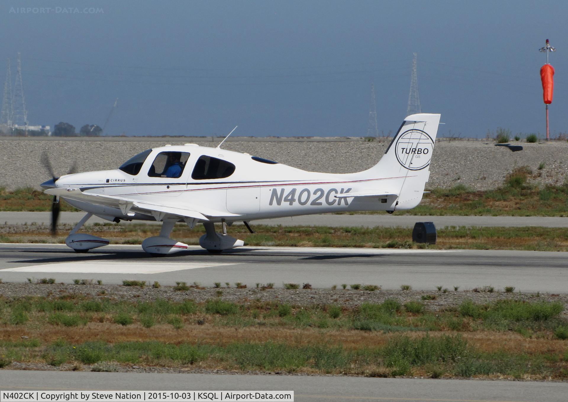 N402CK, Cirrus SR22T C/N 3404, Locally-based 2009 Cirrus Design SR22 Turbo rolling on takeoff @ San Carlos Airport, CA