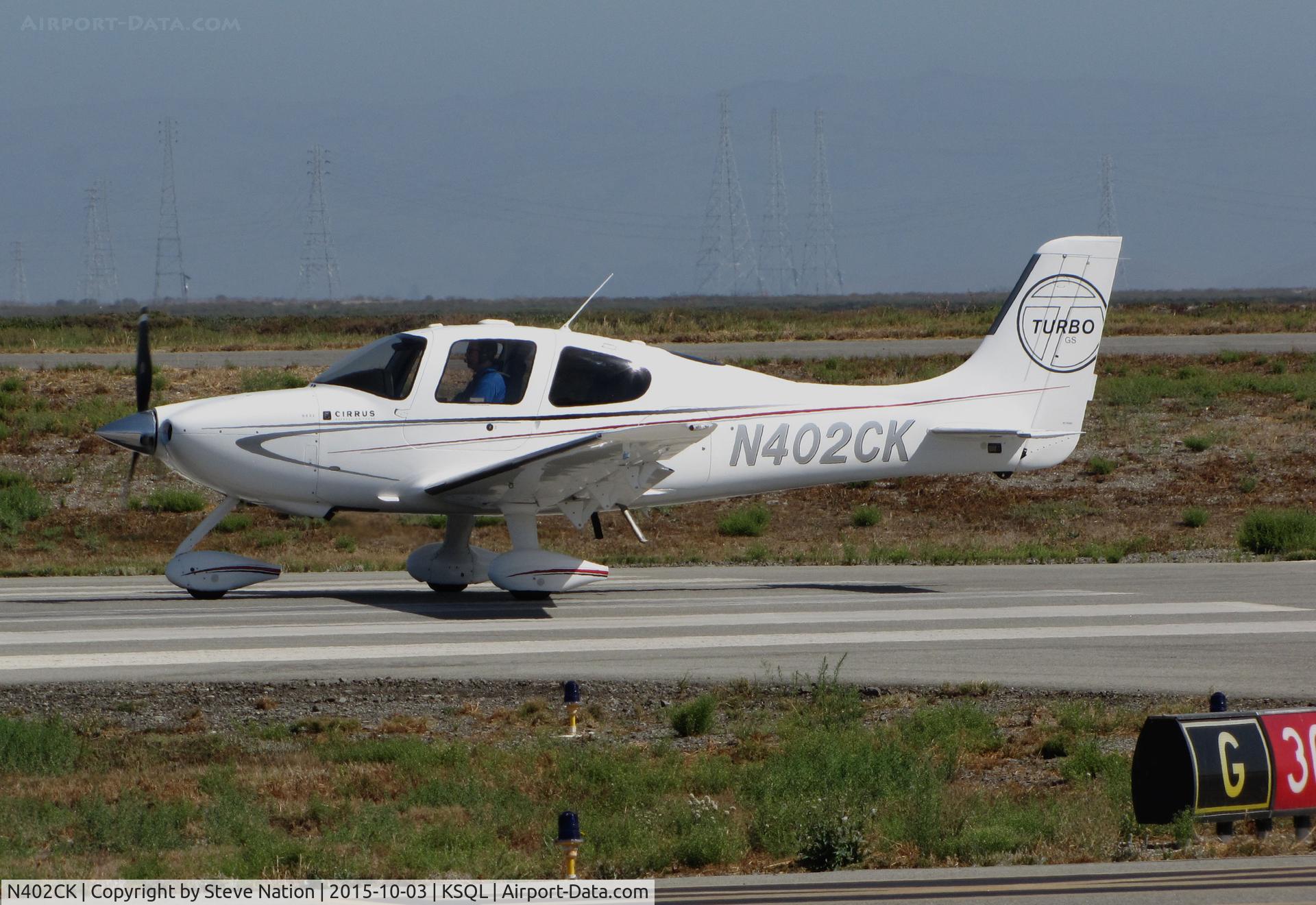 N402CK, Cirrus SR22T C/N 3404, Locally-based 2009 Cirrus Design SR22 Turbo rolling on takeoff @ San Carlos Airport, CA