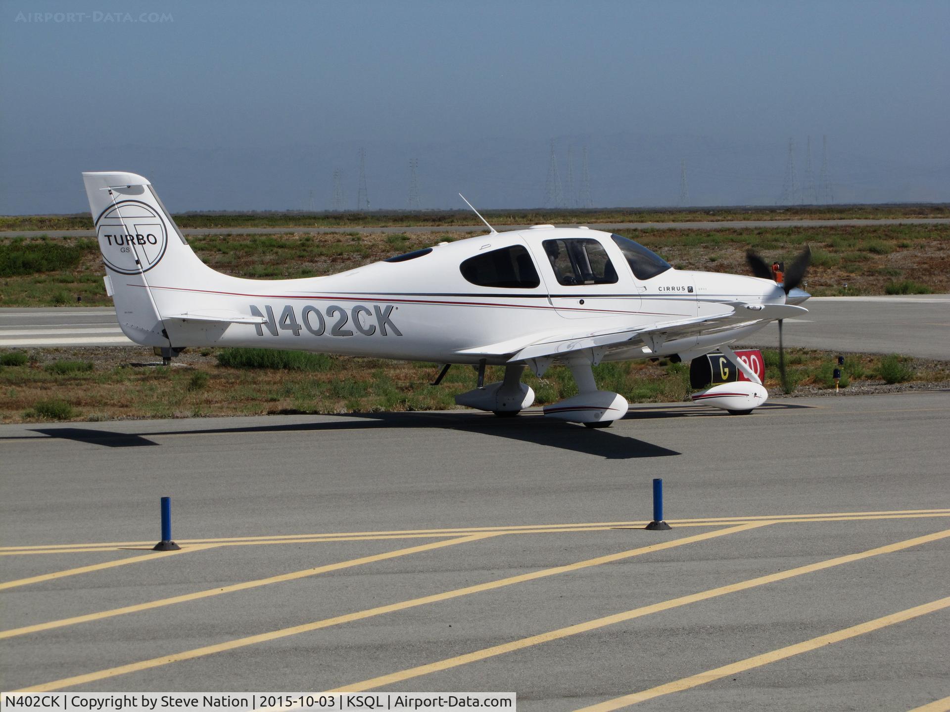 N402CK, Cirrus SR22T C/N 3404, Locally-based 2009 Cirrus Design SR22 Turbo holding for takeoff @ San Carlos Airport, CA