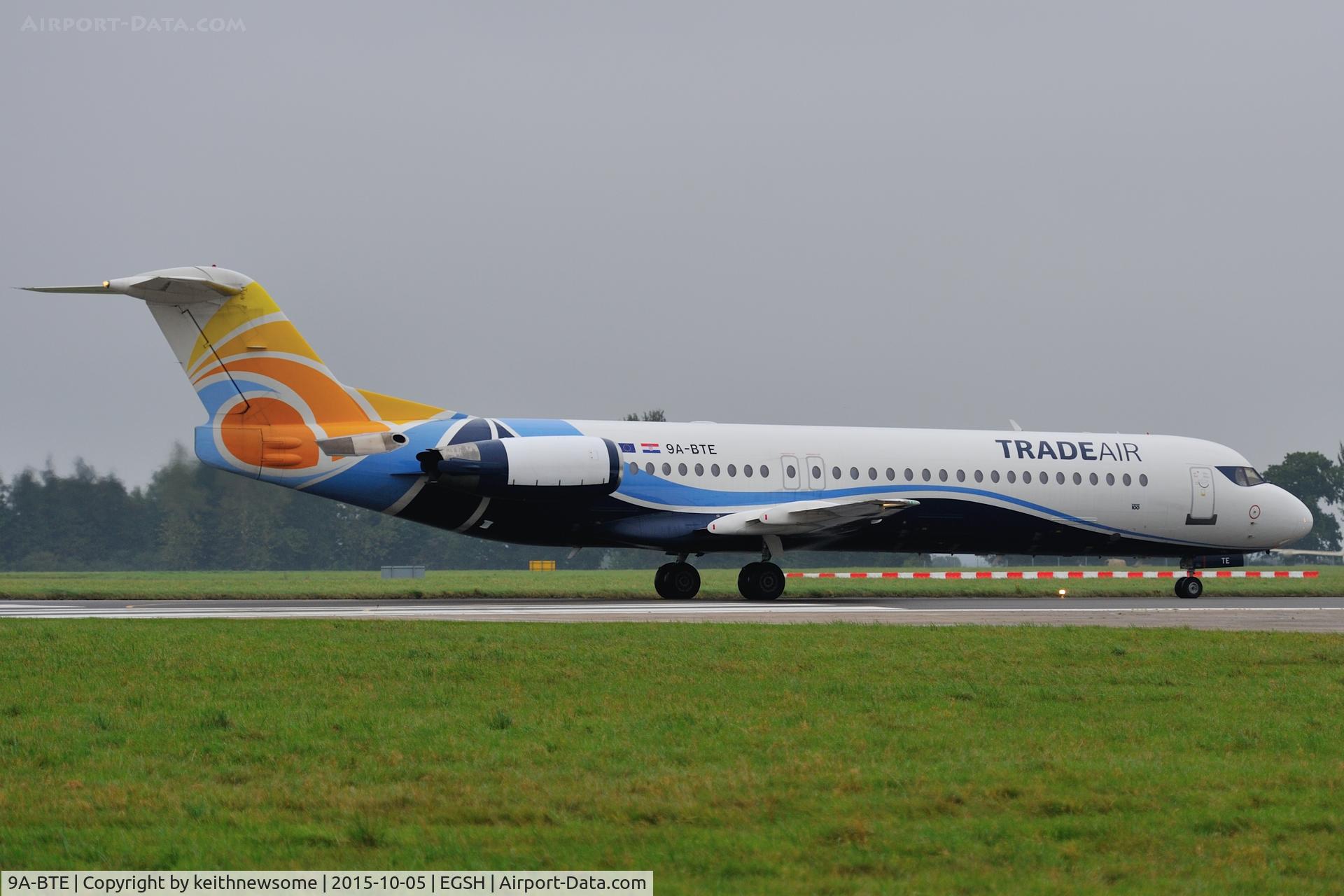 9A-BTE, 1992 Fokker 100 (F-28-0100) C/N 11416, Leaving wet Norwich.