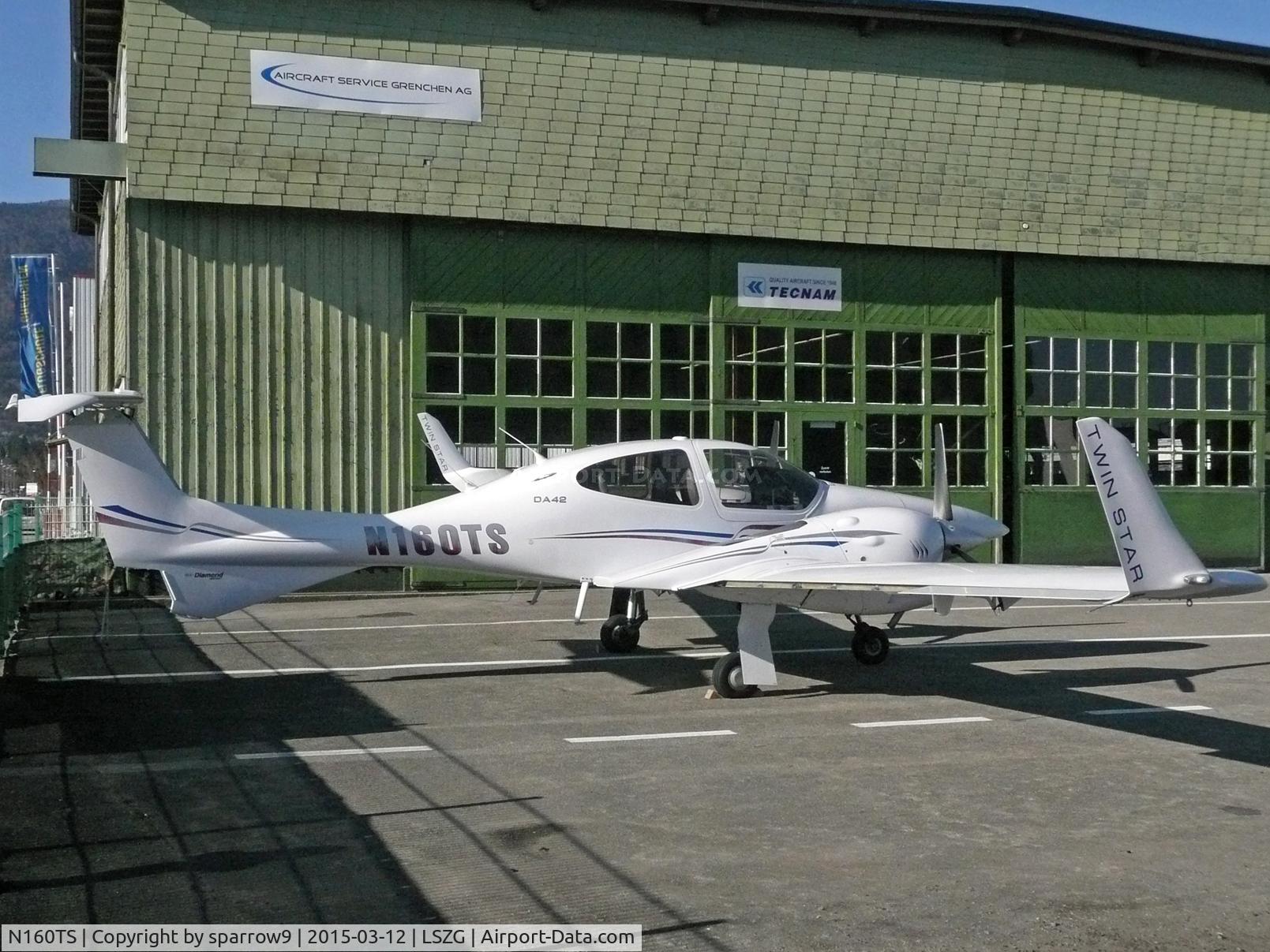N160TS, 2006 Diamond DA-42 Twin Star C/N 42.AC008, a long time in front of a maintenance hangar