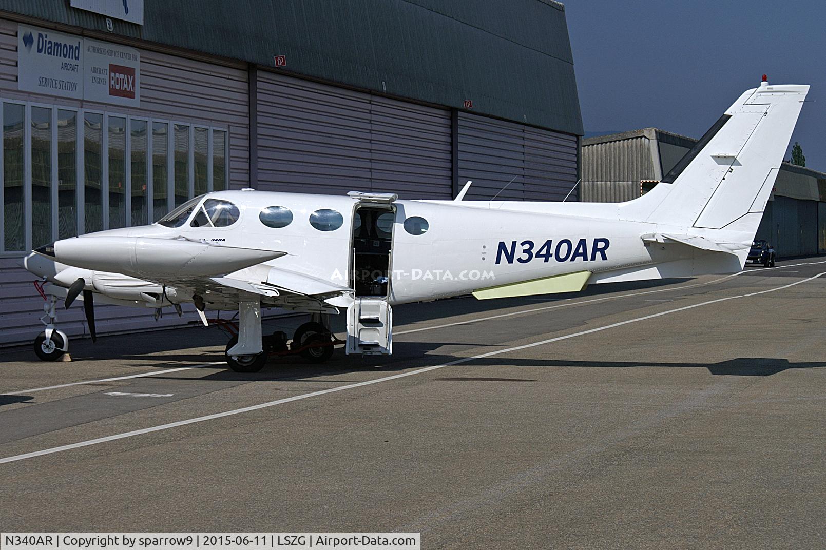 N340AR, 1981 Cessna 340A C/N 340A1263, In front of a maintenance hangar. Simple paint scheme