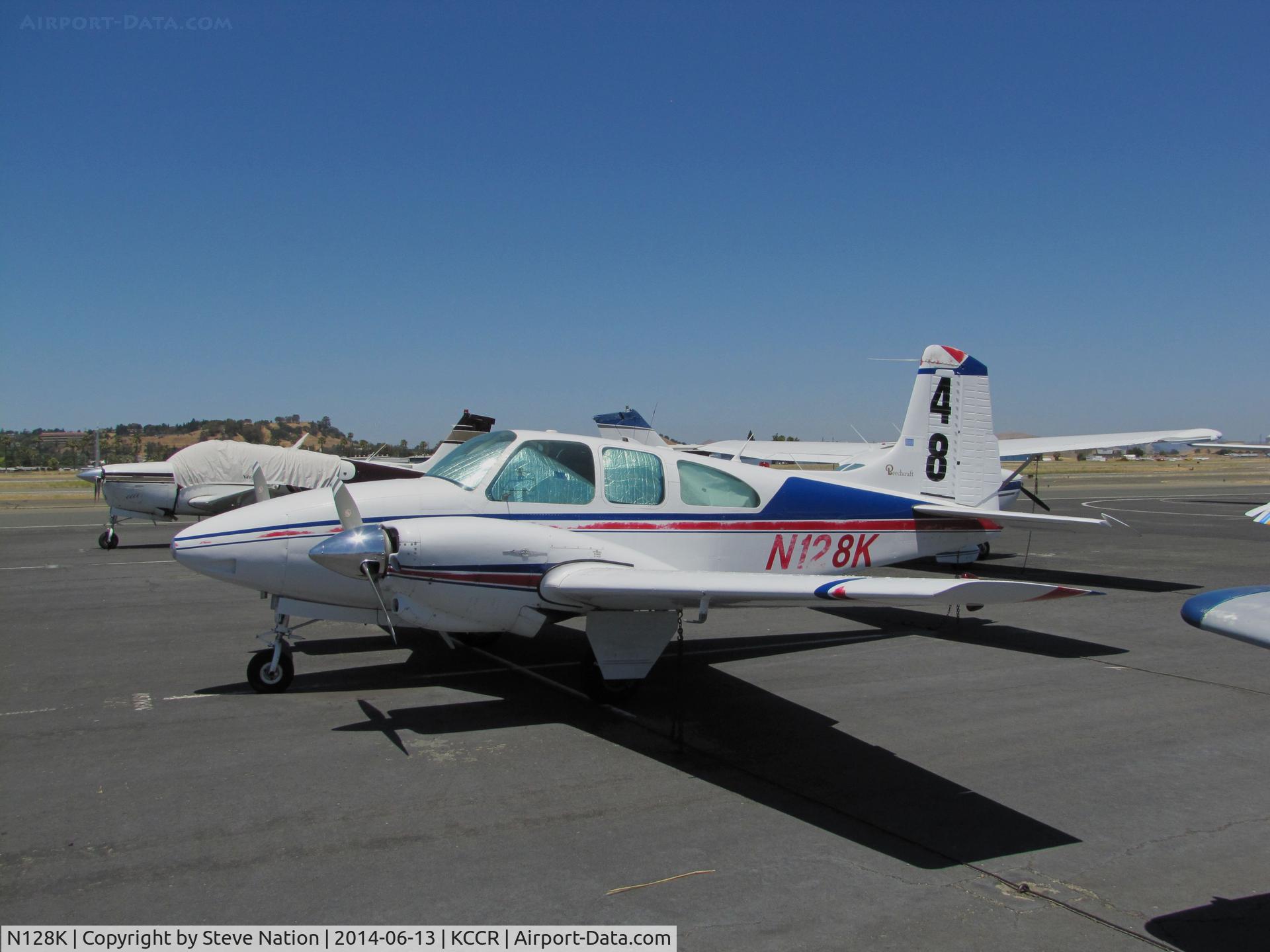 N128K, 1961 Beech B95A Travel Air C/N TD-488, SoCal-based 1961 Beech B95A Baron participated in 2014 Air Race Classic as #48. Photo @ Buchanan Field, Concord, CA 1st leg of cross-country race. Pilots Emily Lewis and Alicia Sikes called themselves the Friendly Fliers.
