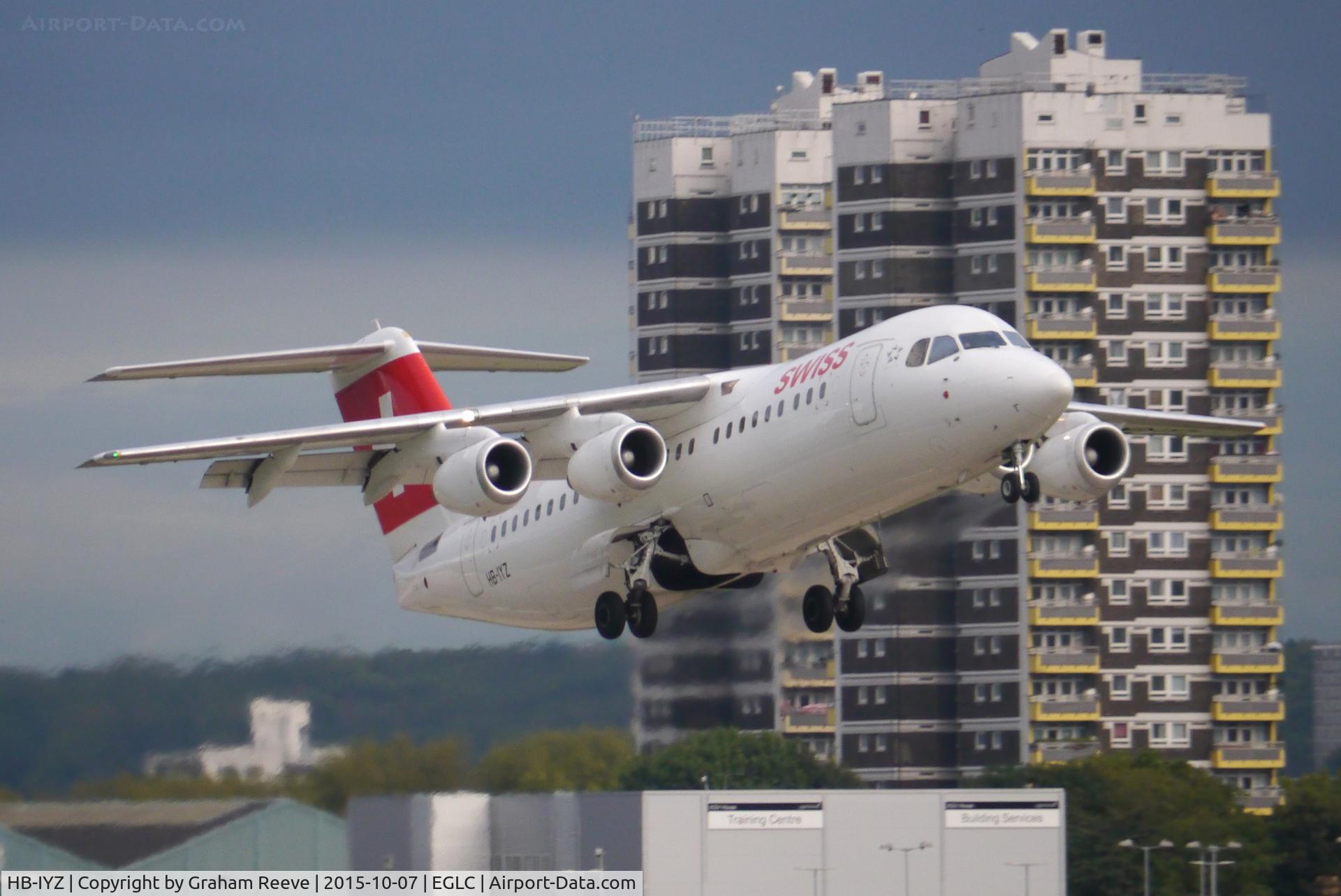 HB-IYZ, 1998 British Aerospace Avro 146-RJ100 C/N 0338, Departing from London City Airport.