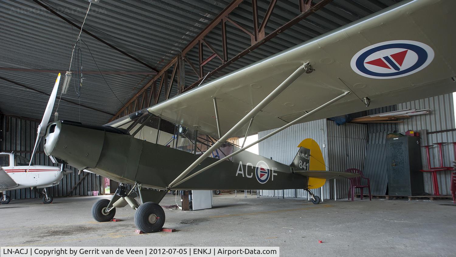 LN-ACJ, 1953 Piper L-18C Super Cub C/N 18-3241, this aircraft was seen in a hangar at the airfield