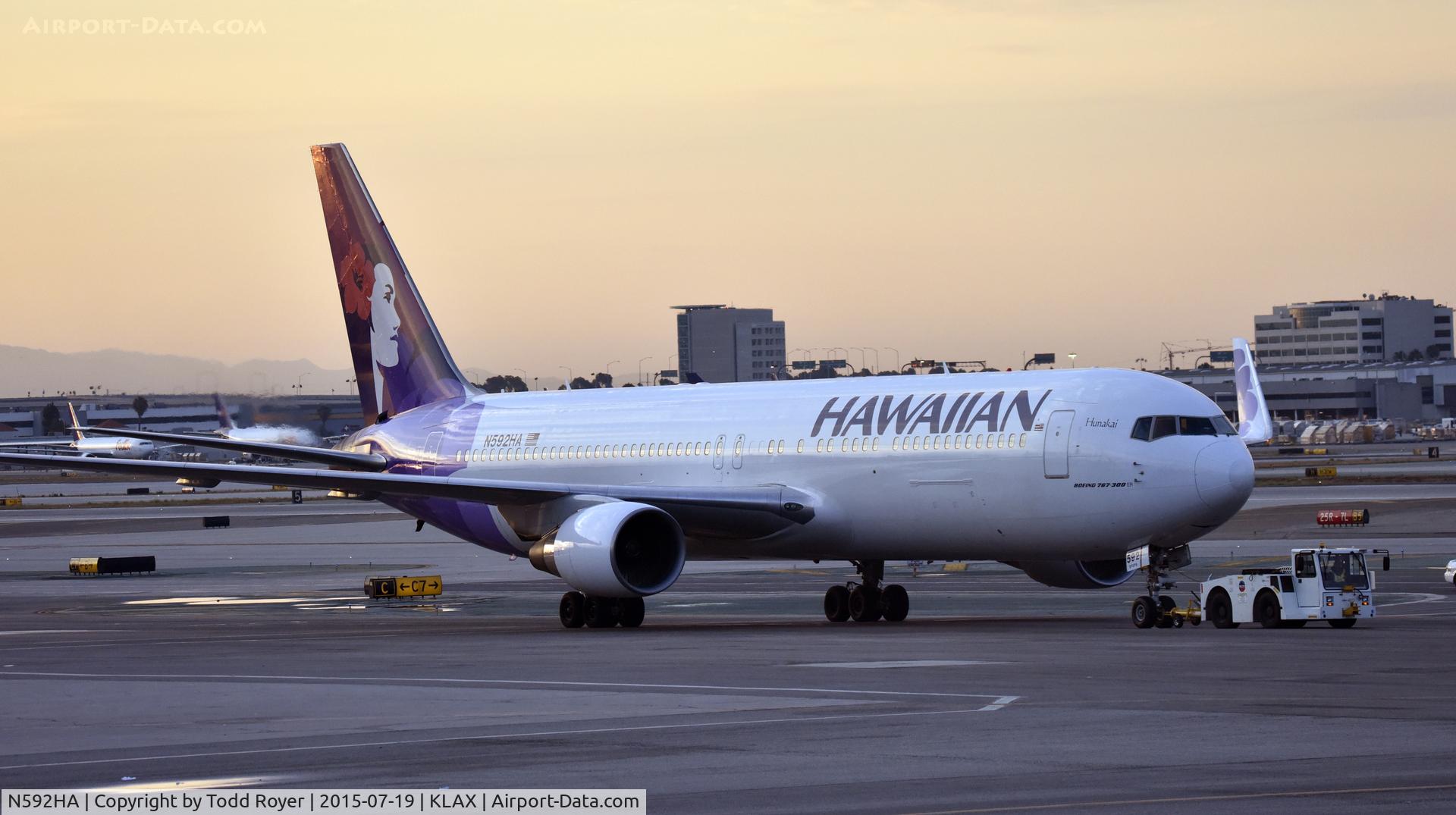 N592HA, 2002 Boeing 767-3CB C/N 33468, Early morning tow to gate