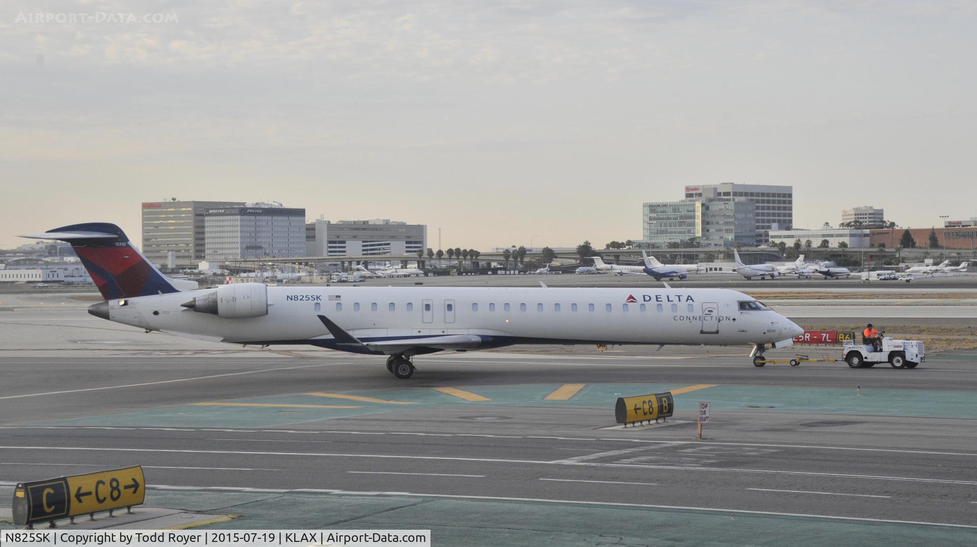 N825SK, 2008 Canadair CL-600-2D24 Regional Jet CRJ-900ER C/N 15212, Early morning tow at LAX