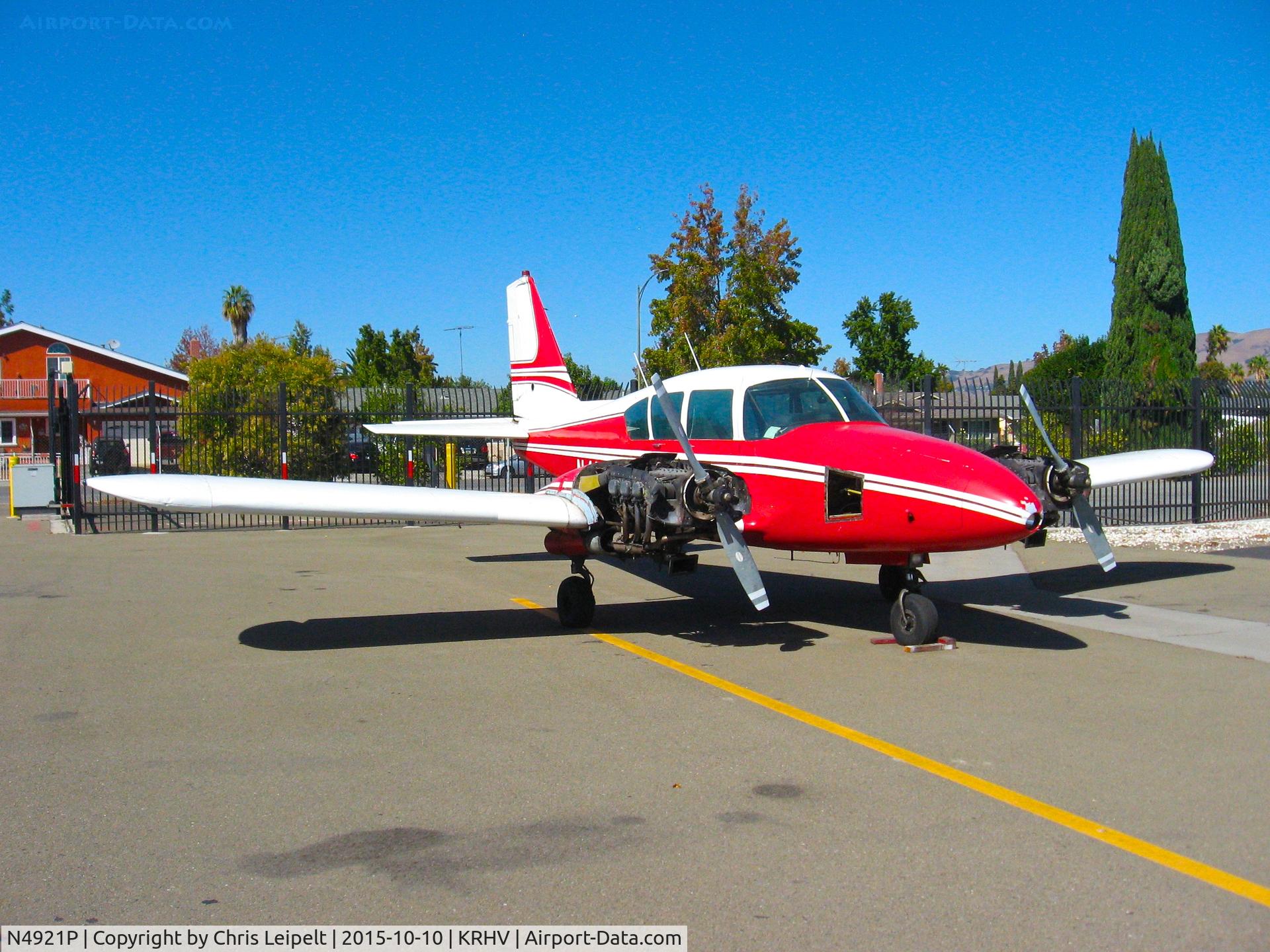 N4921P, 1962 Piper PA-23-235 Apache C/N 27-511, Locally-based 1962 Piper Aztec (with both engine cowlings removed) sitting on the Victory Aero ramp for major inspection at Reid Hillview Airport, San Jose, CA.