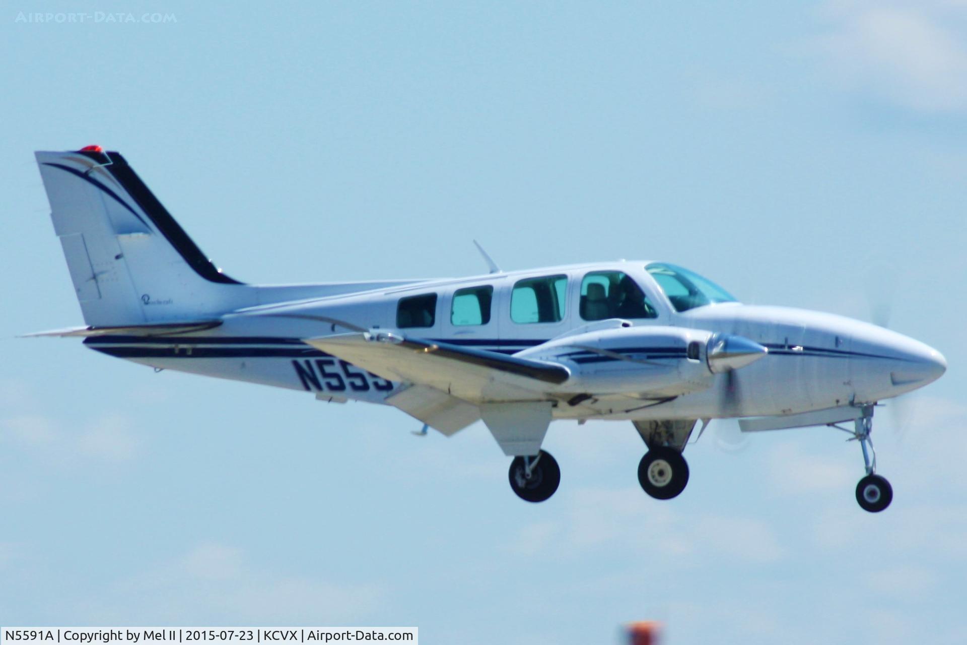 N5591A, 1989 Beech 58 Baron C/N TH-1566, KDET-KCVX - Landing RWY 27