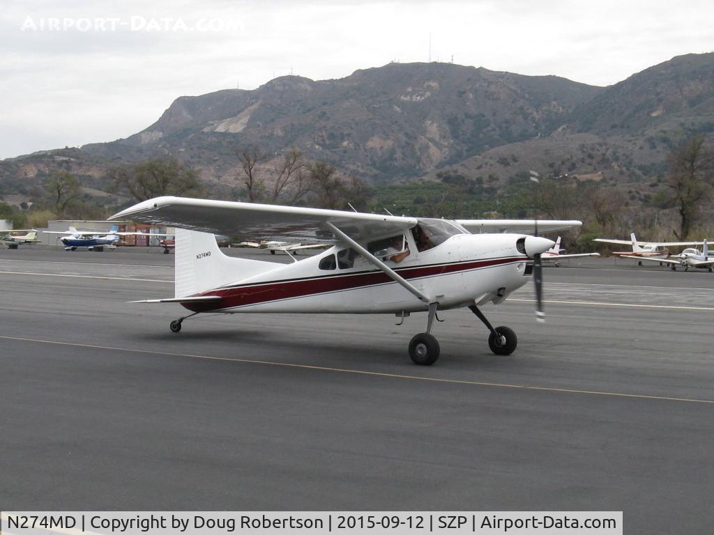 N274MD, 1975 Cessna 180J Skywagon C/N 18052591, 1975 Cessna 180J SKYWAGON. Continental O-470-S 230 Hp, taxi off Rwy 22 to hangar after Bruce's impressive really short STOL demos. Not much runway needed!