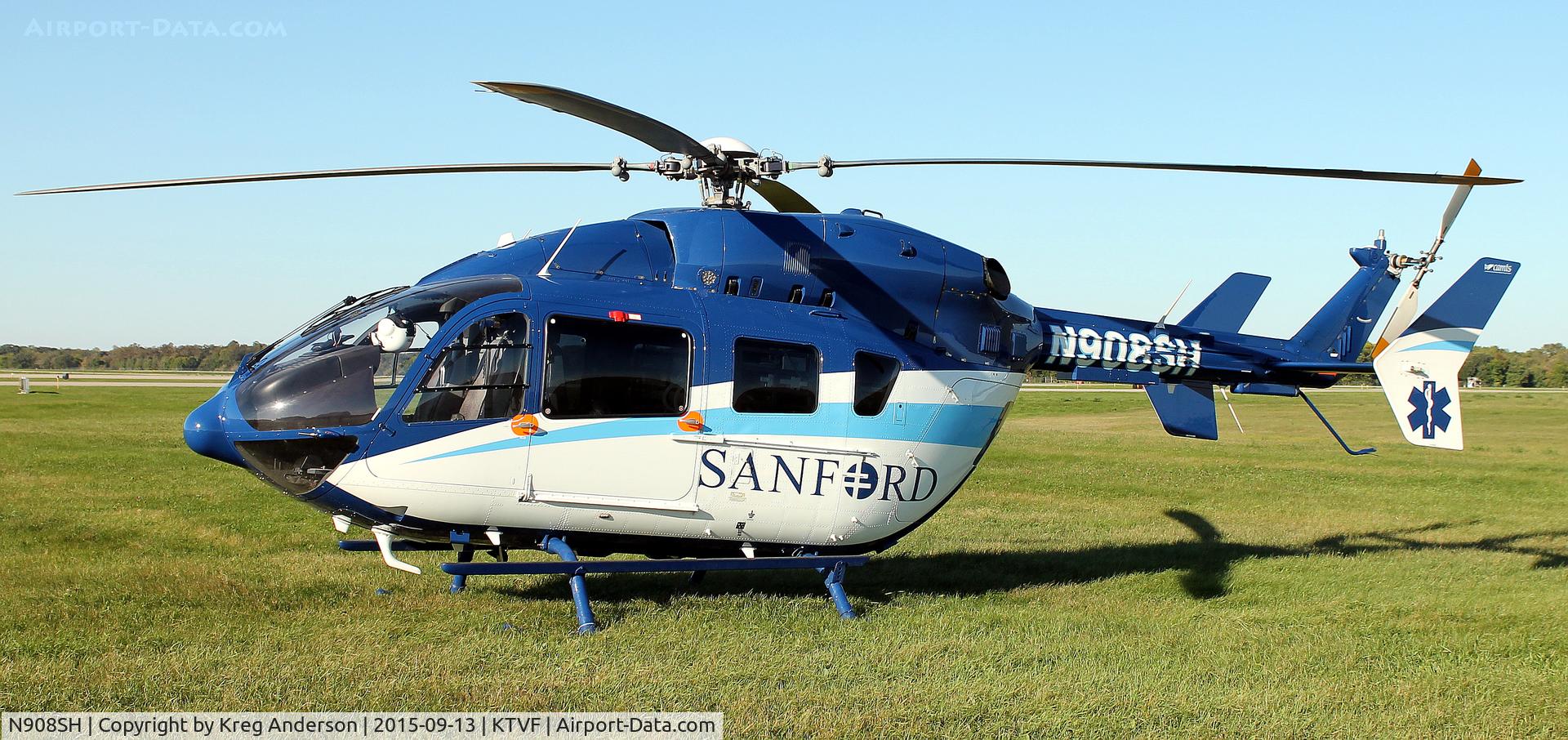 N908SH, Eurocopter-Kawasaki EC-145 (BK-117C-2) C/N 9482, Sanford Medical's Eurocopter EC-145 on the grass in Thief River Falls, MN.