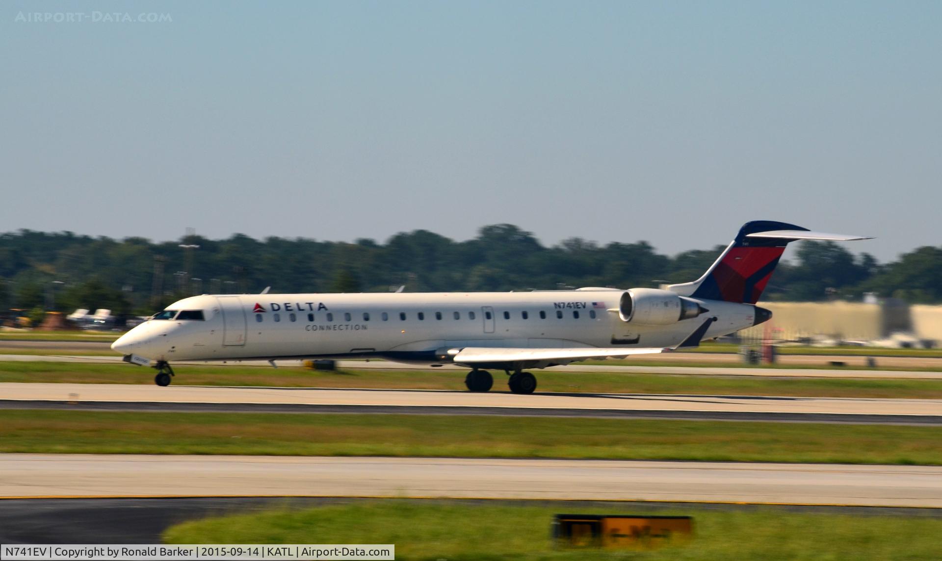 N741EV, 2004 Bombardier CRJ-701ER (CL-600-2C10) Regional Jet C/N 10155, Takeoff Atlanta