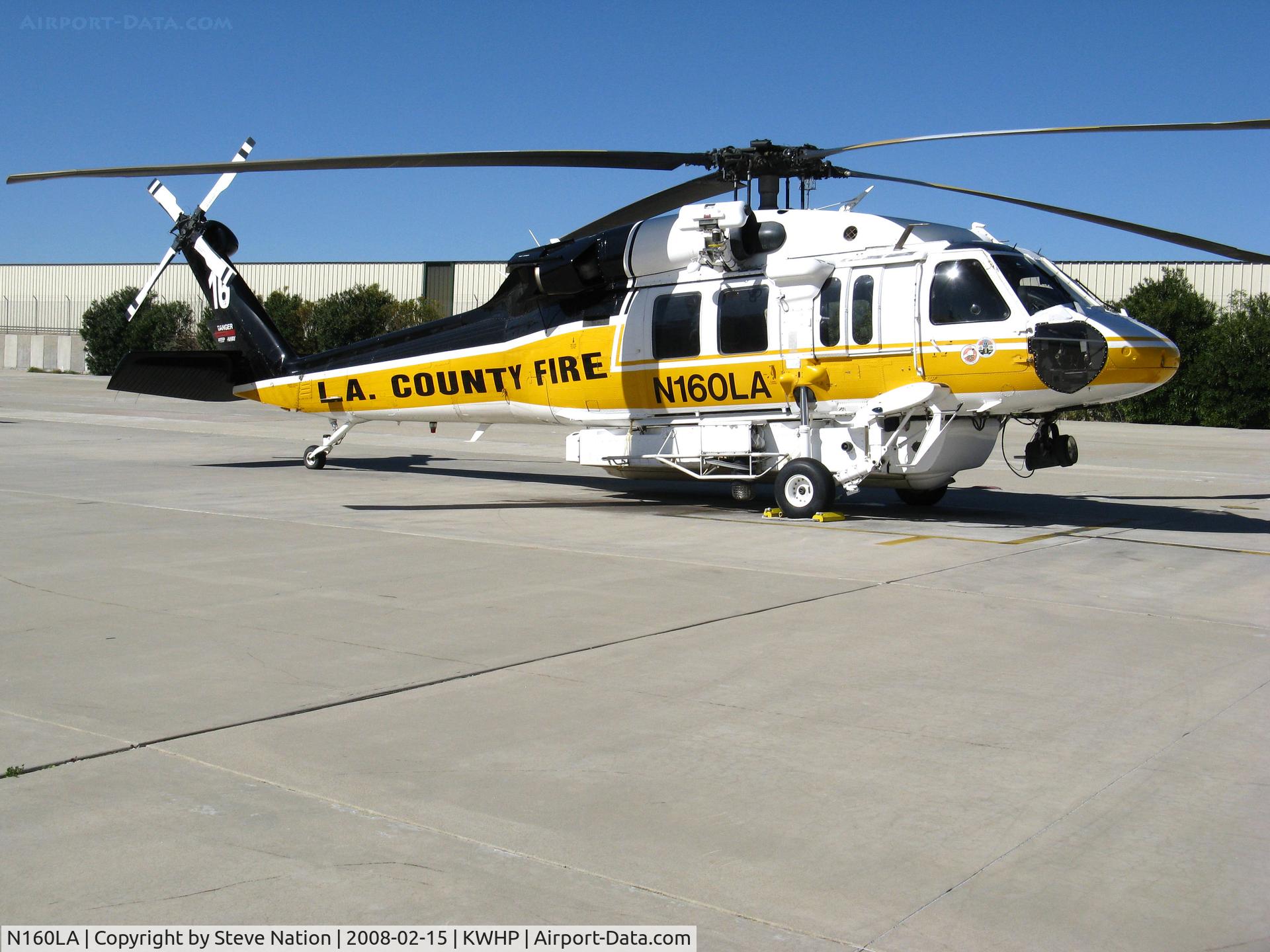 N160LA, 2000 Sikorsky S-70A Firehawk C/N 702453, Los Angeles County Fire 2000 Sikorsky S-70A Firehawk Helitanker #16 on ramp @ Whiteman Airport, Pacoima, CA home base
