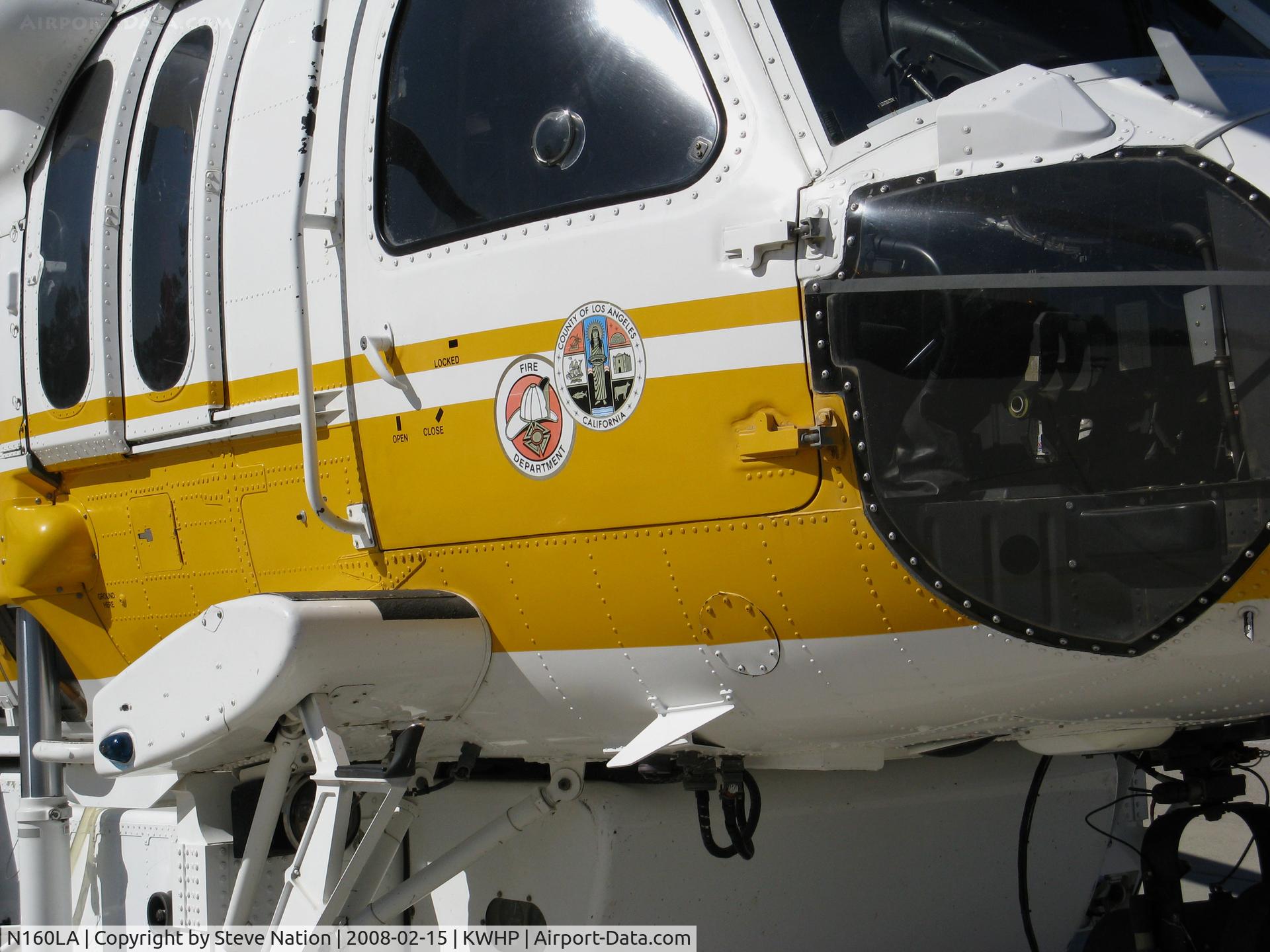 N160LA, 2000 Sikorsky S-70A Firehawk C/N 702453, CLOSE-UP of Logos on Los Angeles County Fire 2000 Sikorsky S-70A Firehawk Helitanker #16 on ramp @ Whiteman Airport, Pacoima, CA home base