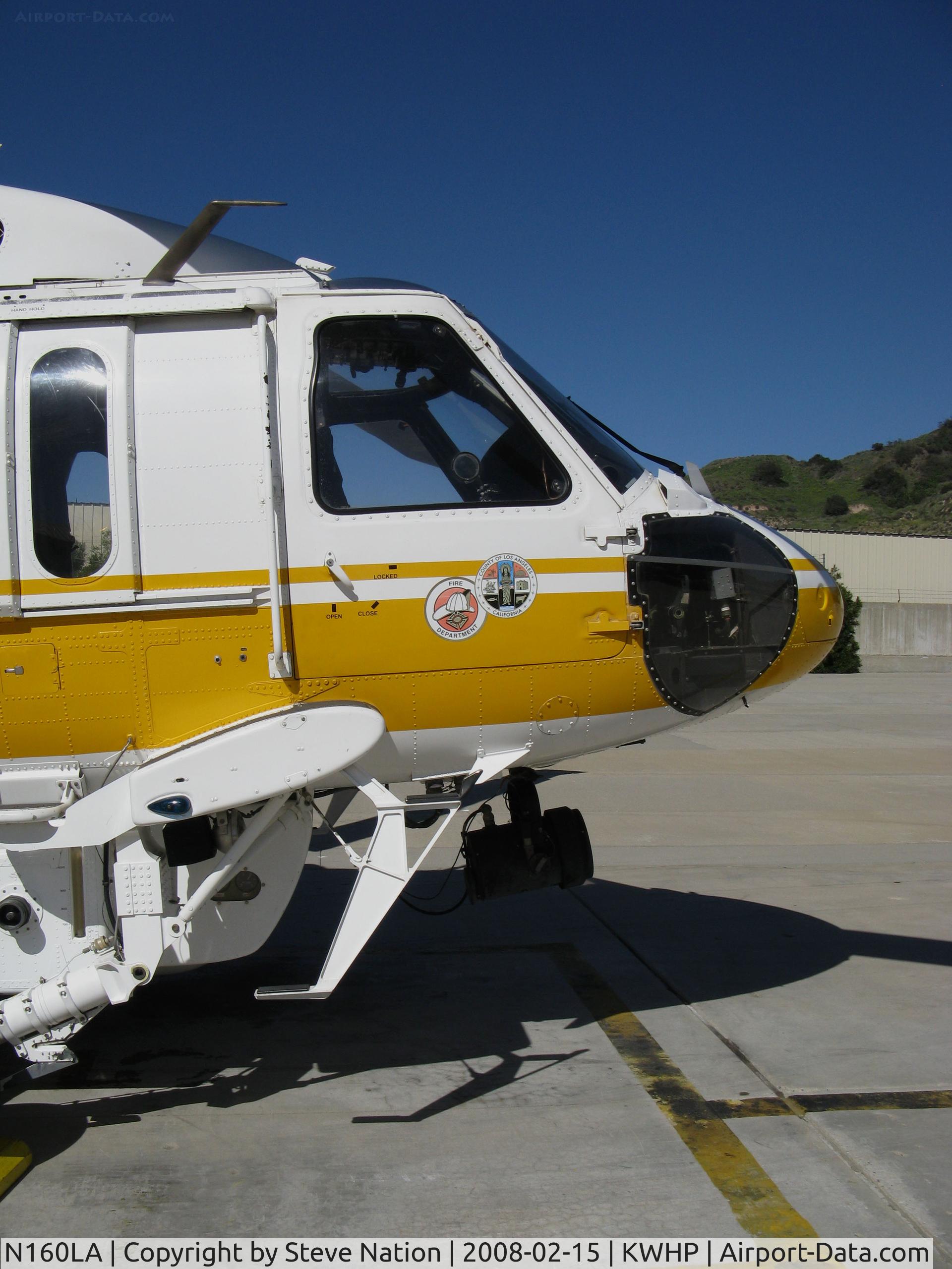 N160LA, 2000 Sikorsky S-70A Firehawk C/N 702453, CLOSE-UP nose: Los Angeles County Fire 2000 Sikorsky S-70A Firehawk Helitanker #16 on ramp @ Whiteman Airport, Pacoima, CA home base