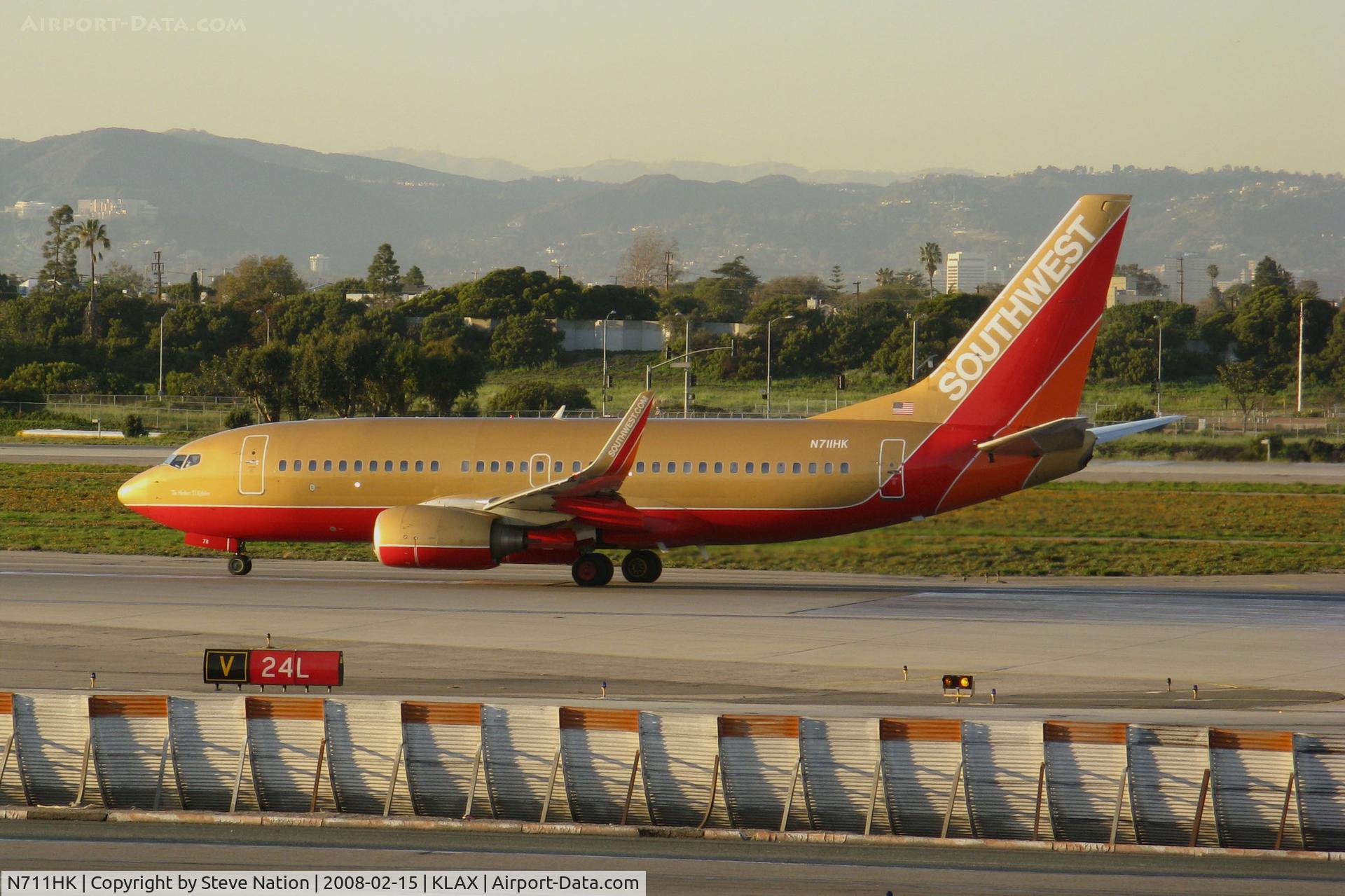 N711HK, 1998 Boeing 737-7H4 C/N 27845, Southwest Airlines 1998 Boeing 737-7H4 in old colors lined up for takeoff @ Los Angeles International airport, CA