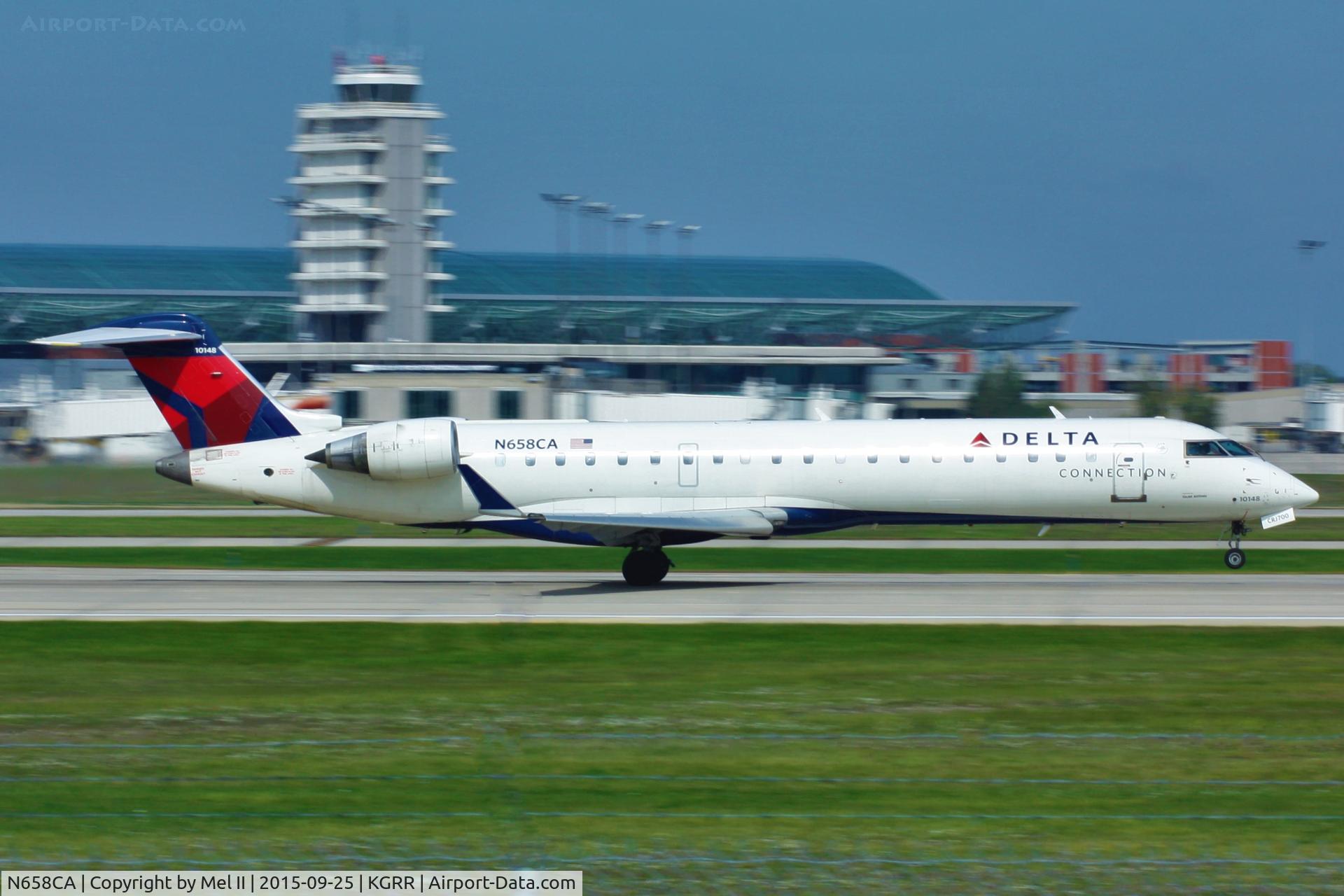 N658CA, 2004 Bombardier CRJ-700 (CL-600-2C10) Regional Jet C/N 10148, GJS6184 - KGRR-KLGA - Departing RWY 8R