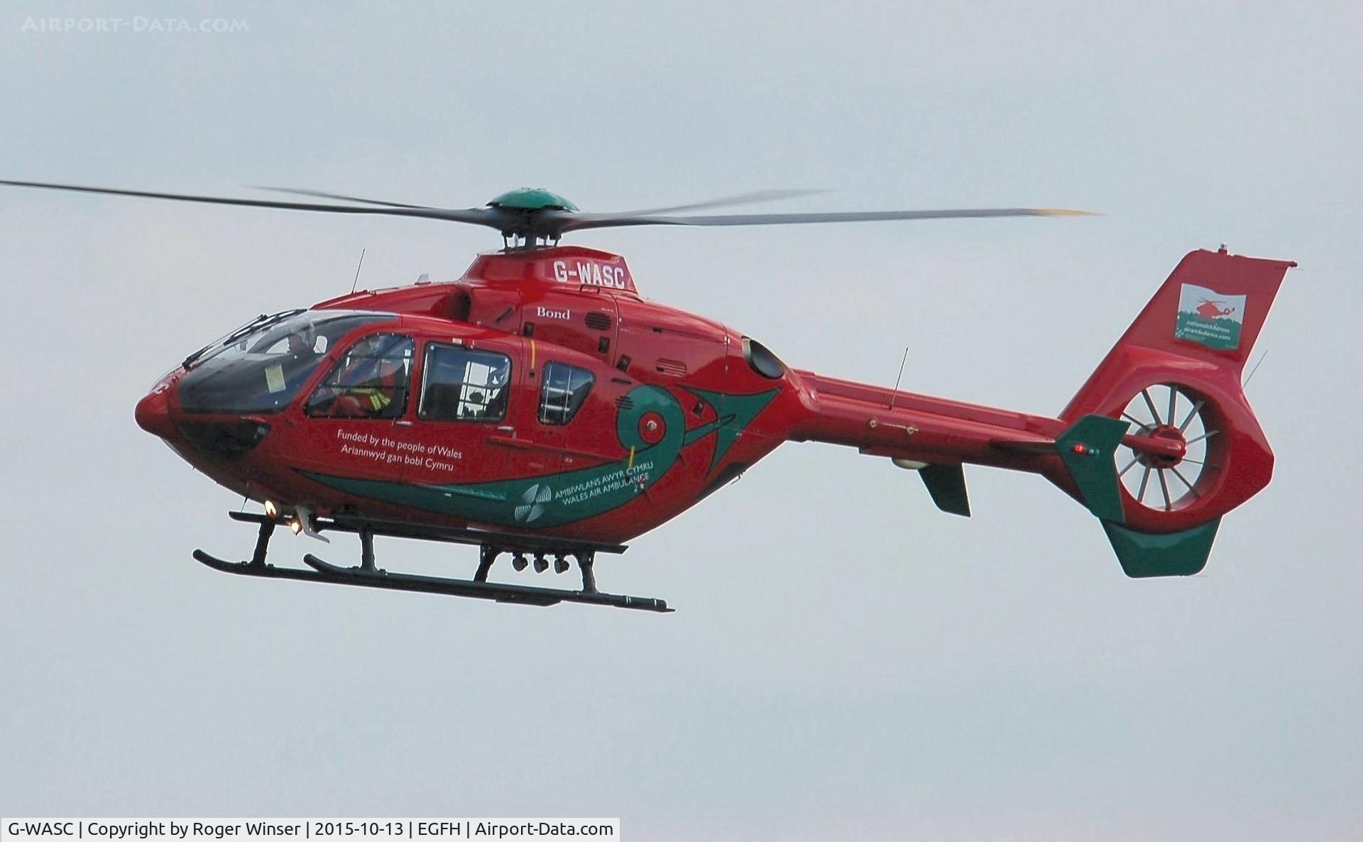 G-WASC, 2012 Eurocopter EC-135T-2+ C/N 1074, Visiting Wales Air Ambulance helicopter (Helimed 59) droping into Swansea Airport.