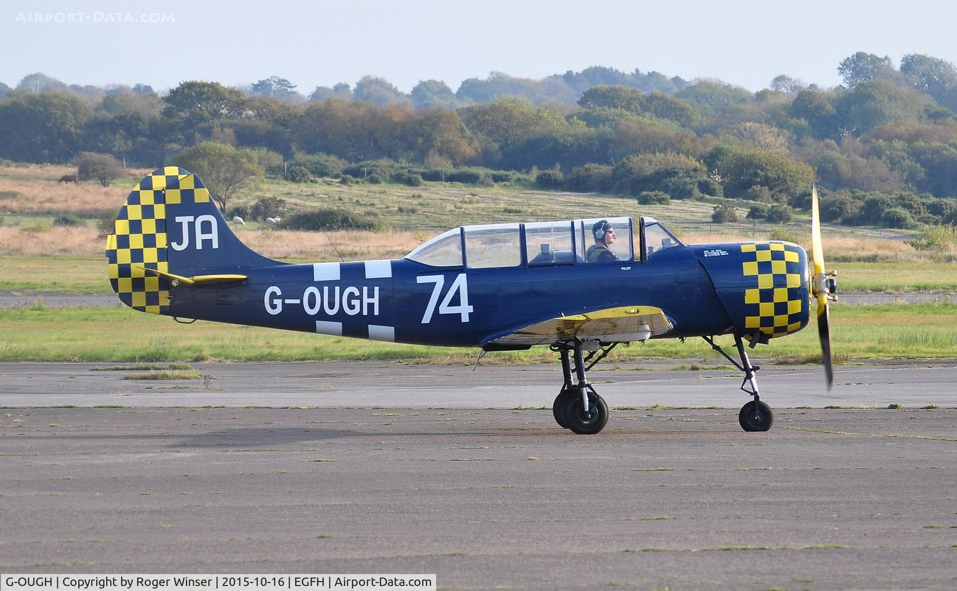 G-OUGH, 1987 Bacau Yak-52 C/N 877404, Resident Yak-52 taxying before takeoff. Coded 62/IV on port side.