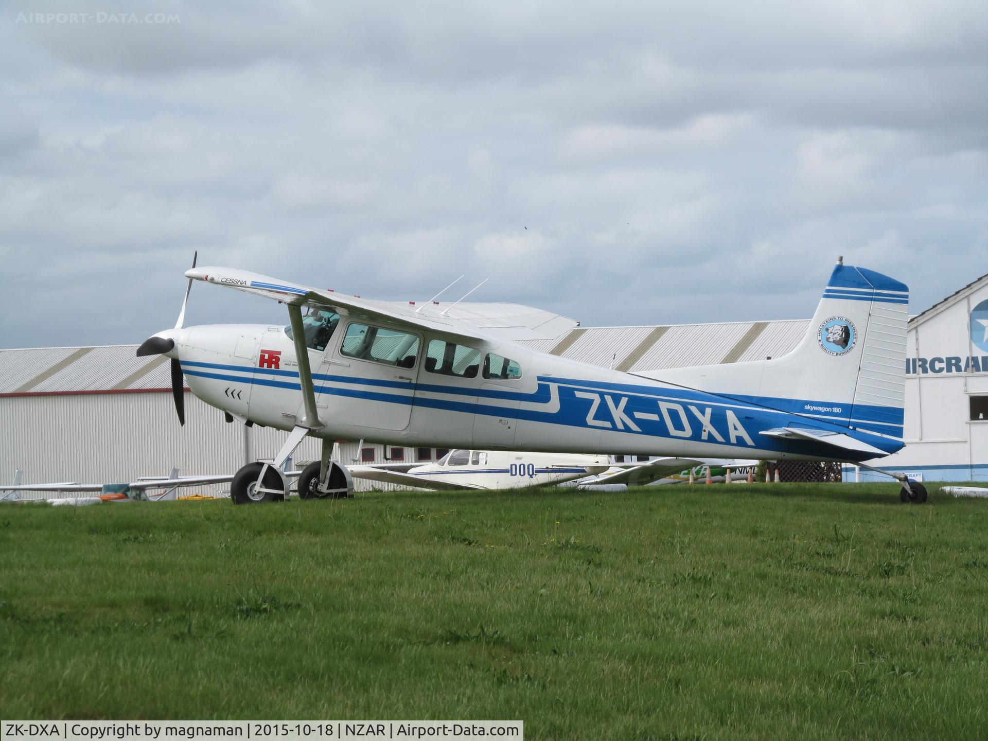 ZK-DXA, Cessna 180J C/N 18052516, on grass at ardmore